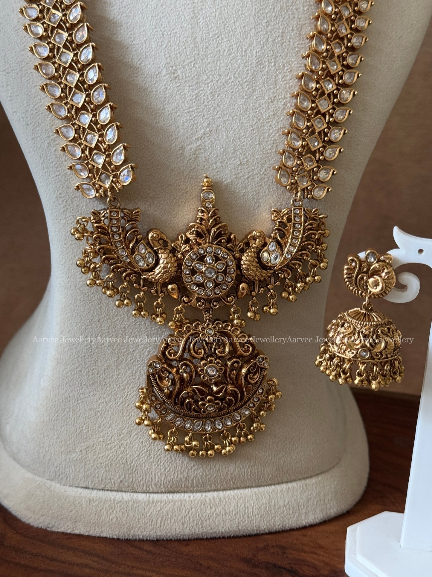 KUNDAN WHITE STONES HARAM SET WITH PEACOCK PENDANT & GOLD BEADS