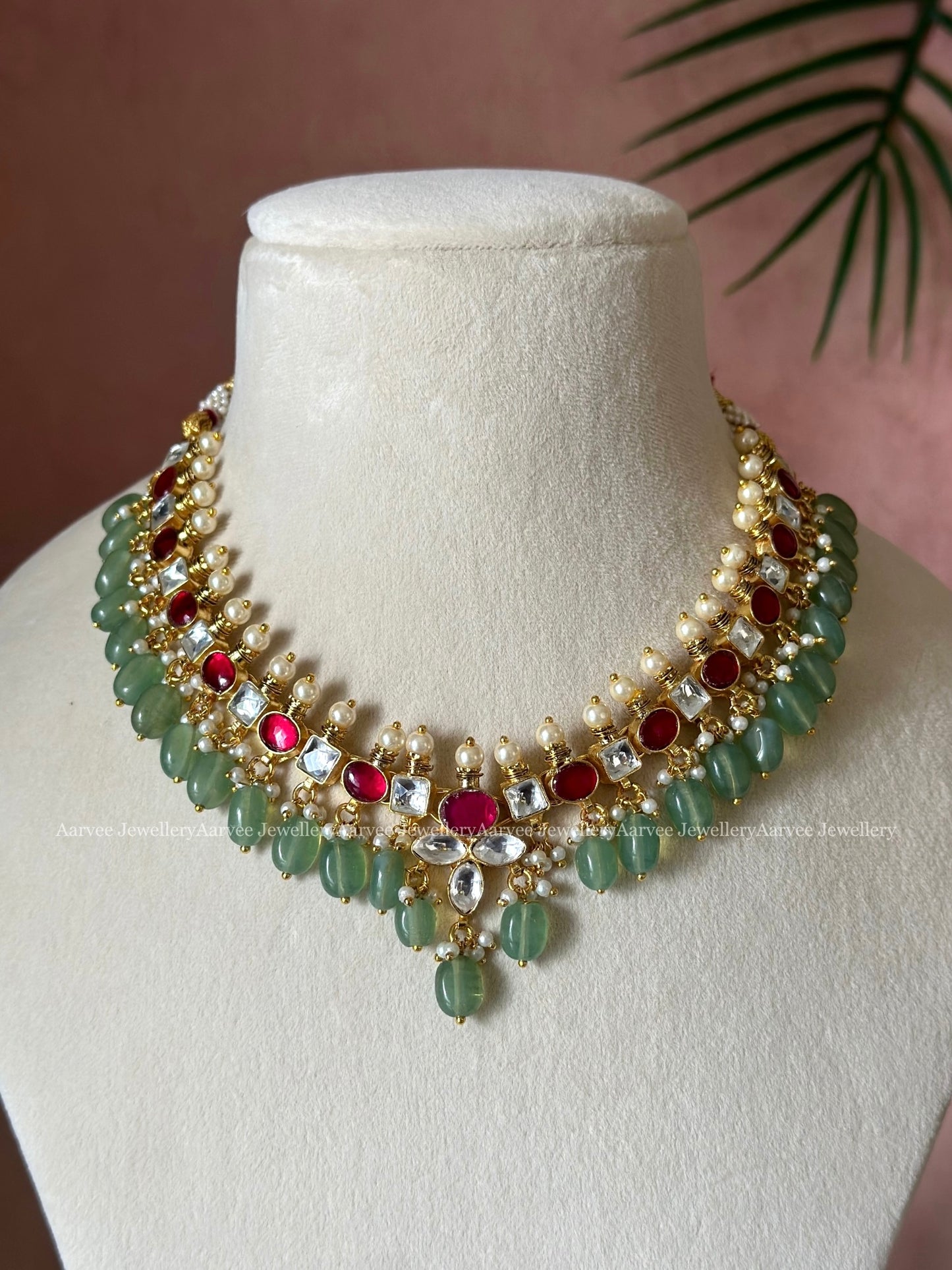 POLKI KUNDAN NECKLACE SET WITH RED STONES AND PASTEL BEADS
