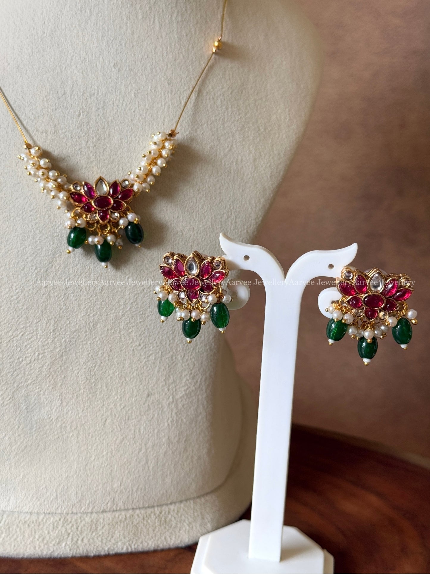 DELICATE INVISIBLE CHAIN SET WITH PEARL LOTUS PENDANT WITH RUBY STONES AND GREEN BEADS