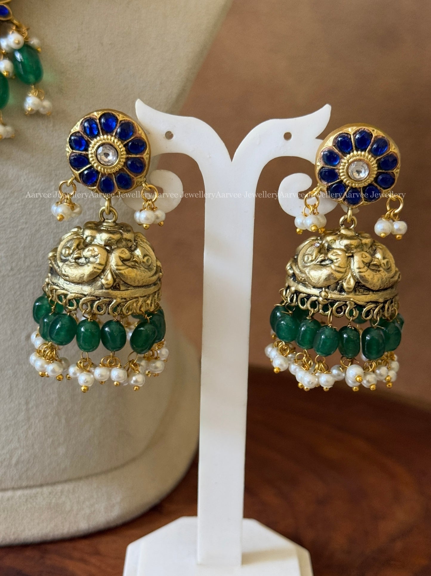 JADAU KUNDAN BLUE STONE LOTUS NECKLACE SET WITH GREEN BEADS