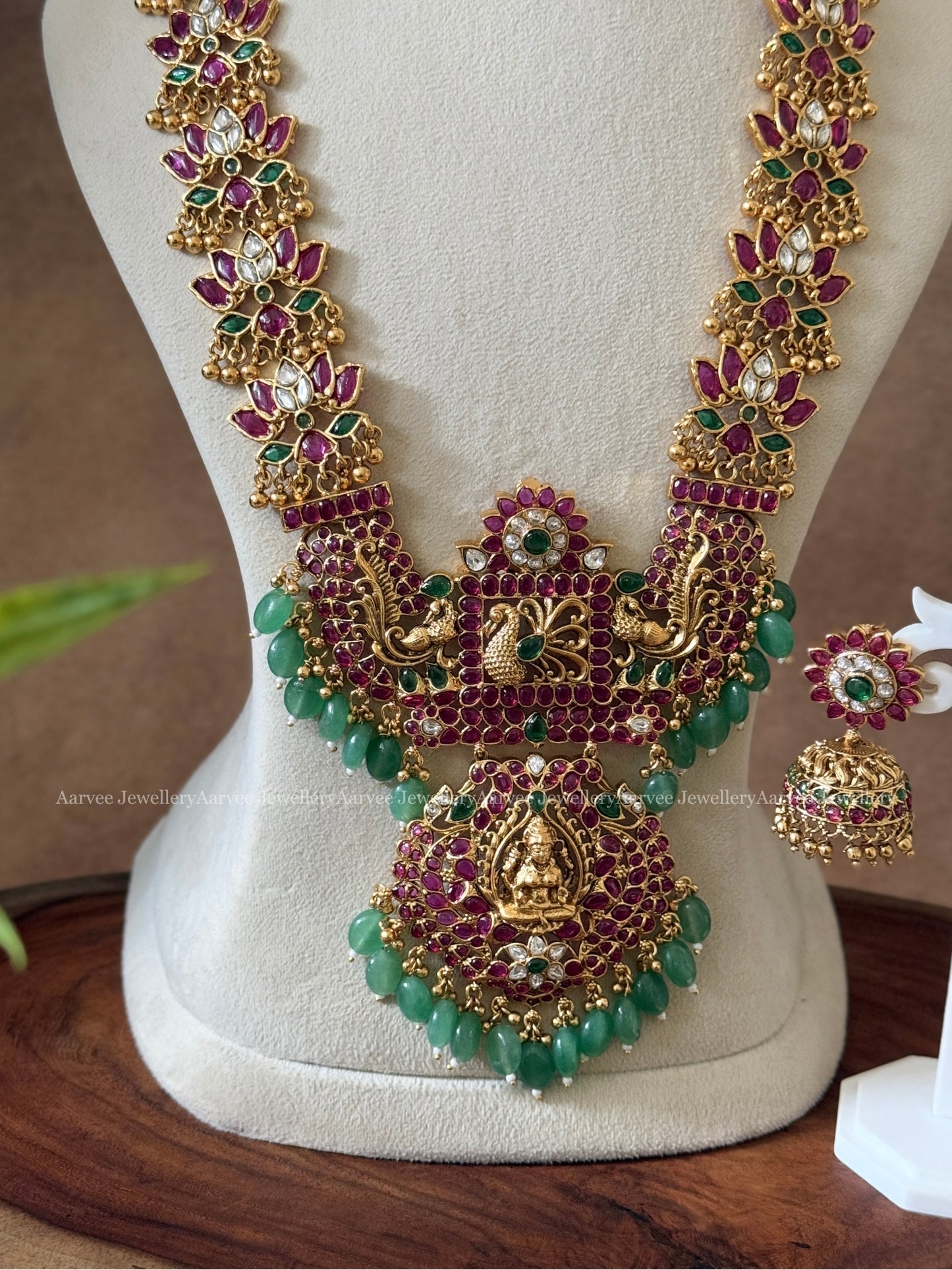 KEMP MULTI COLOR STONES LOTUS MOTIF HARAM SET WITH LAKSHMI PENDANT AND PASTEL BEADS