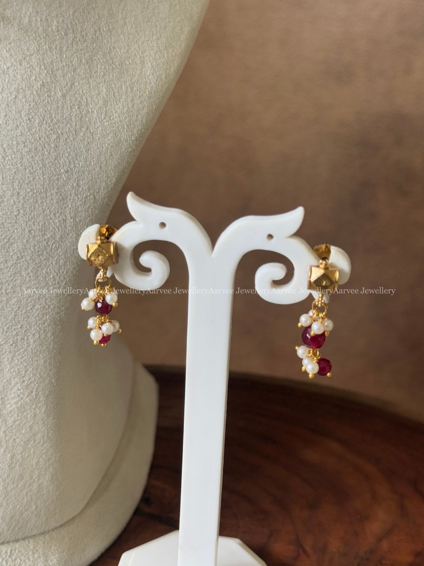 GOLD BALL BEAD NECKLACE WITH LAYERED RUBY BEAD DROPS