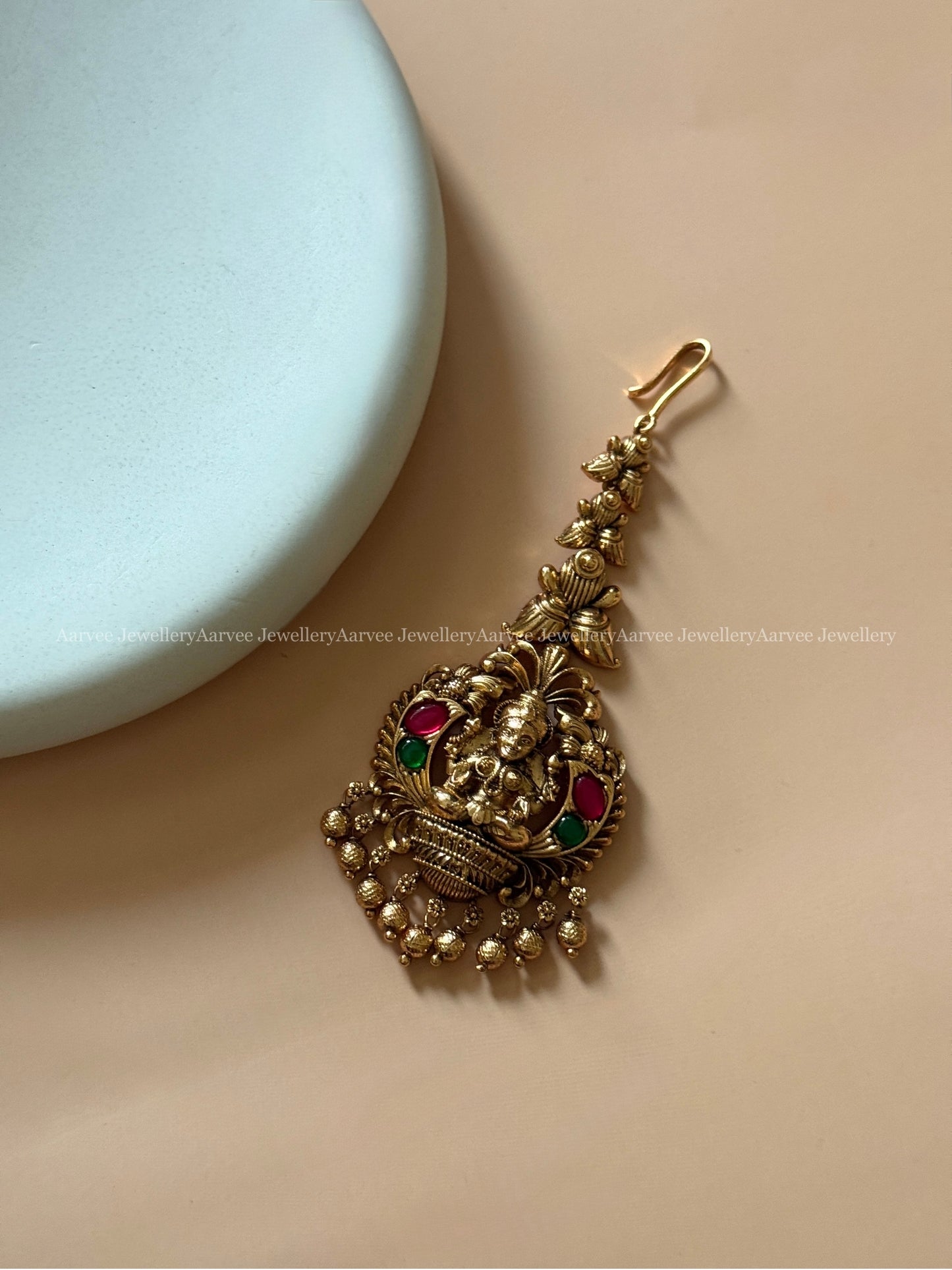 ANTIQUE GOLD LAKSHMI MOTIF TIKKA WITH GOLD BEADS
