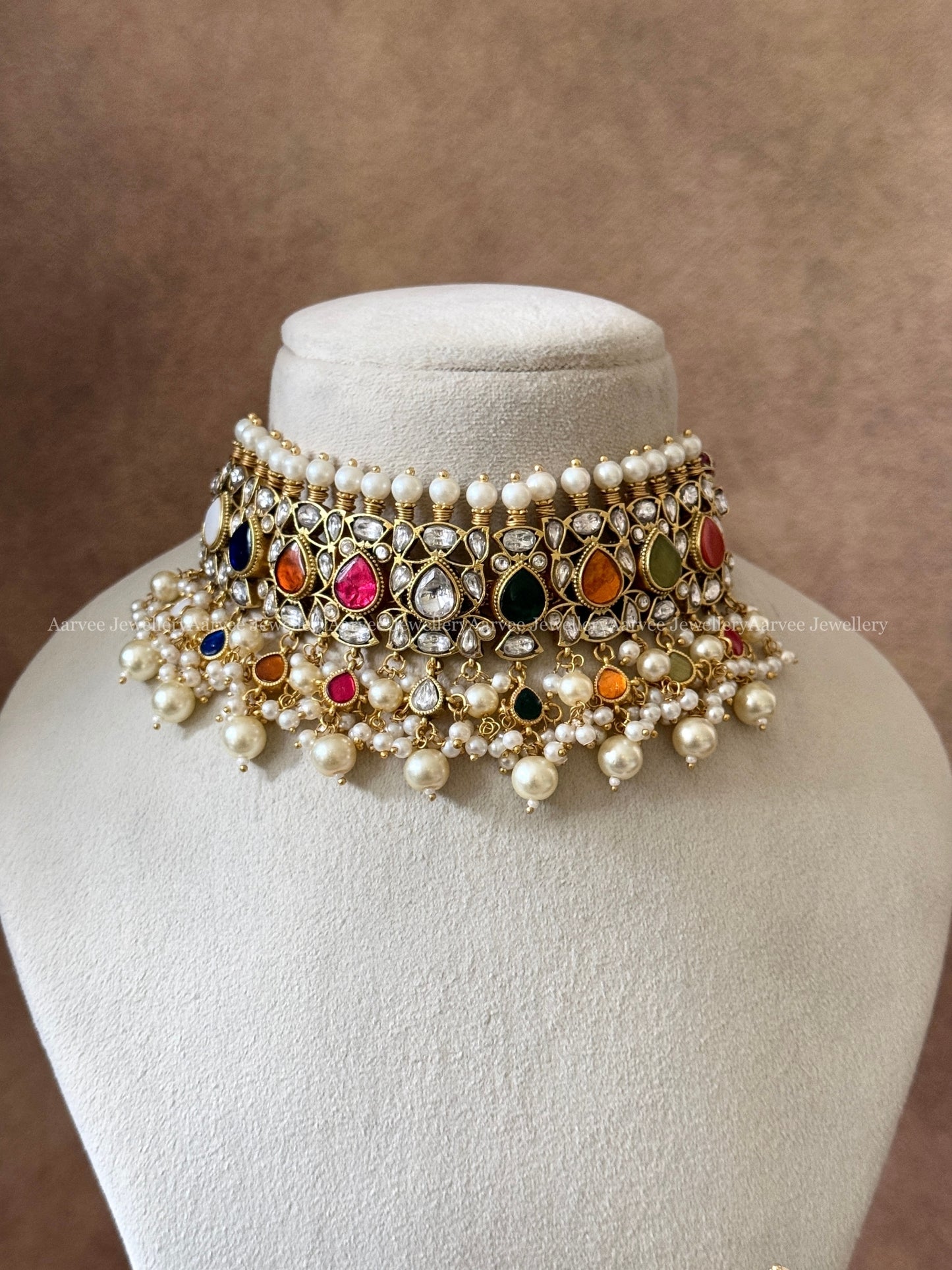 JADAU KUNDAN CHOKER SET WITH NAVARATHNA COLOR STONES AND PEARL BEADS