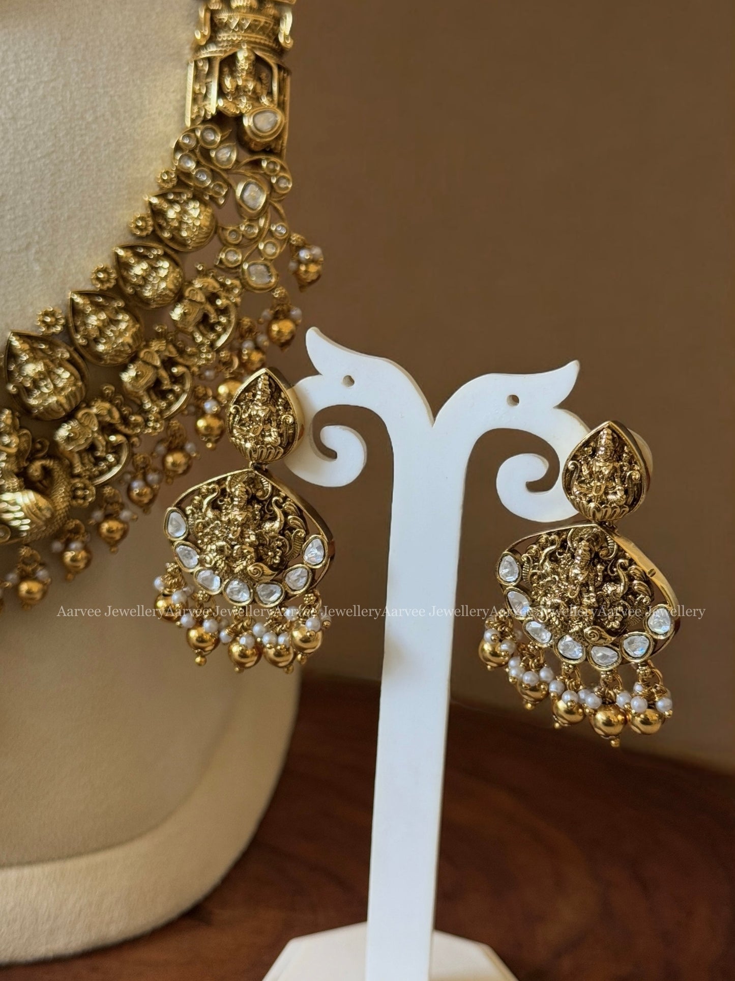 TEMPLE JEWELLERY SEMI BRIDAL SET | GREEN BEADED HAARAM WITH LAKSHMI PENDANT PAIRED WITH A FULL GOLD LAKSHMI NECKLACE IN GOLD BEADS