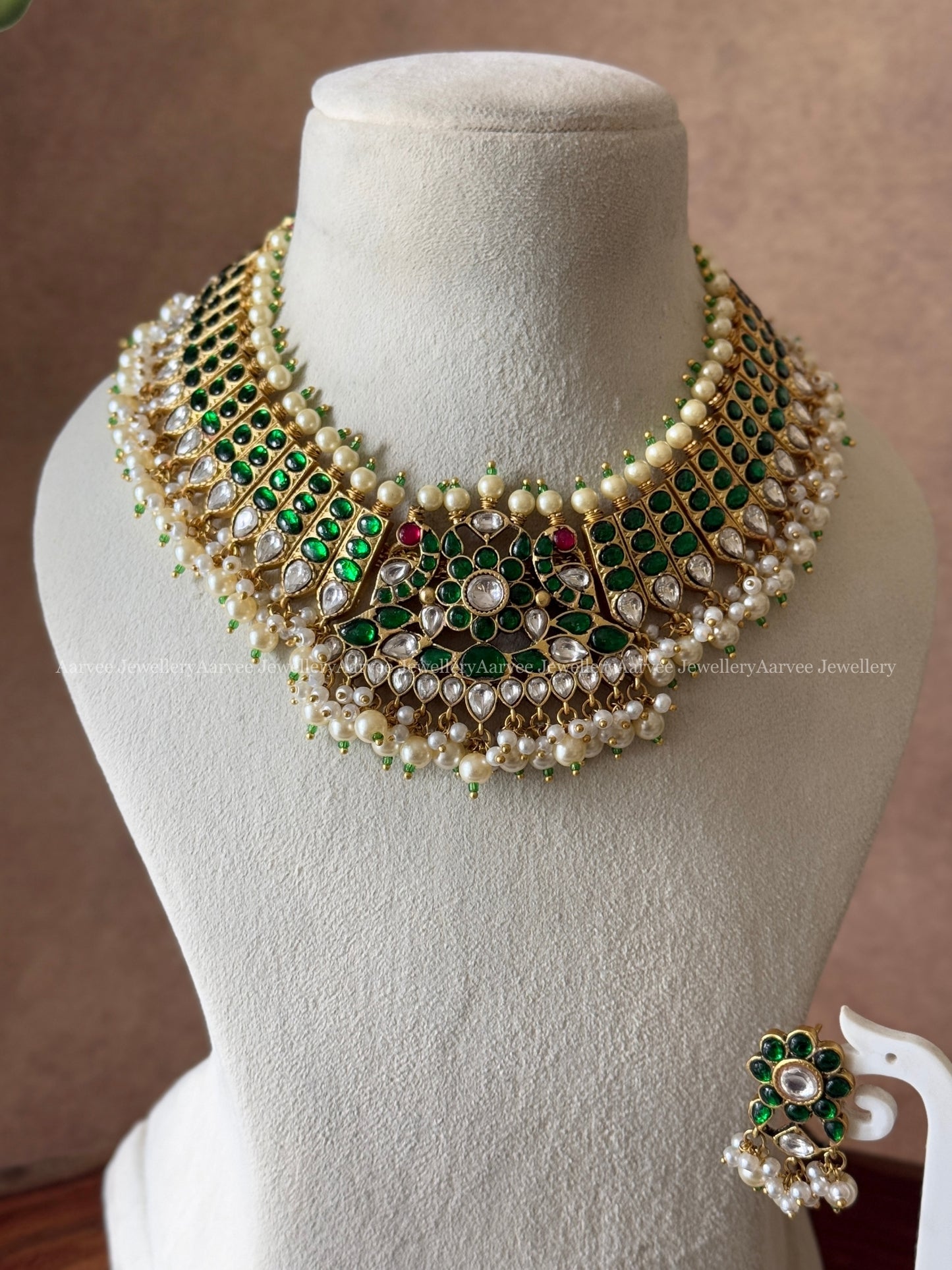 JADAU KUNDAN GREEN STONE NECKLACE SET WITH PEACOCK PENDANT IN PEARLS