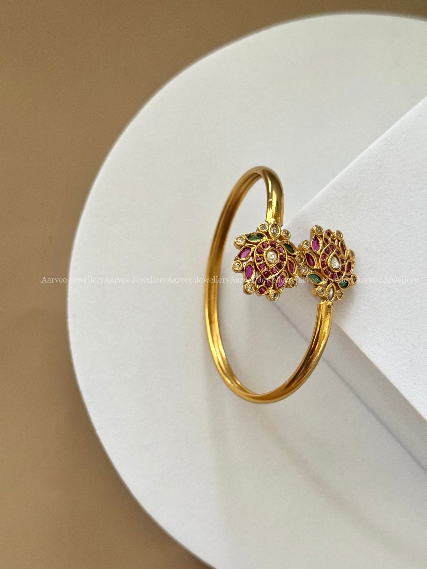 GOLD TONE LOTUS DESIGN BRACELET