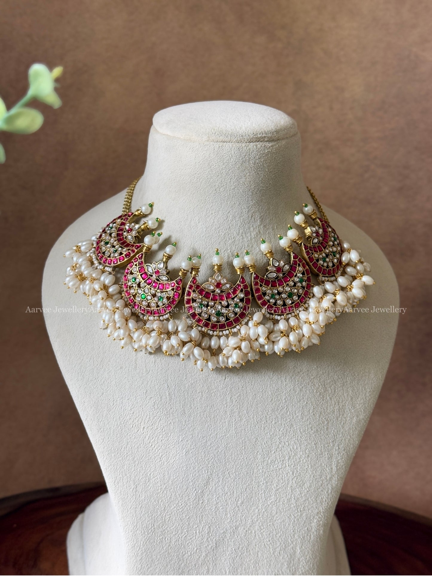JADAU KUNDAN FIVE PENDANT CHAAND DESIGN NECKLACE IN PINK STONES AND RICE PEARLS DROPPINGS