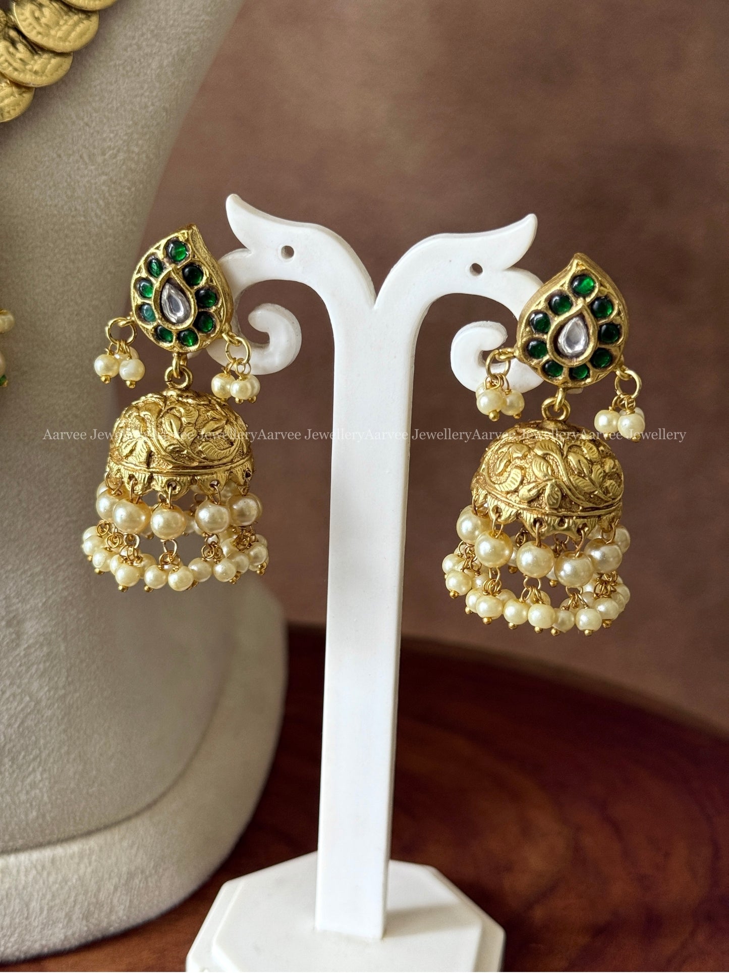 COIN MIDLENGTH CHAIN WITH JADAU KUNDAN GREEN STONE PEACOCK PENDANT & JHUMKI IN PEARL BEADS