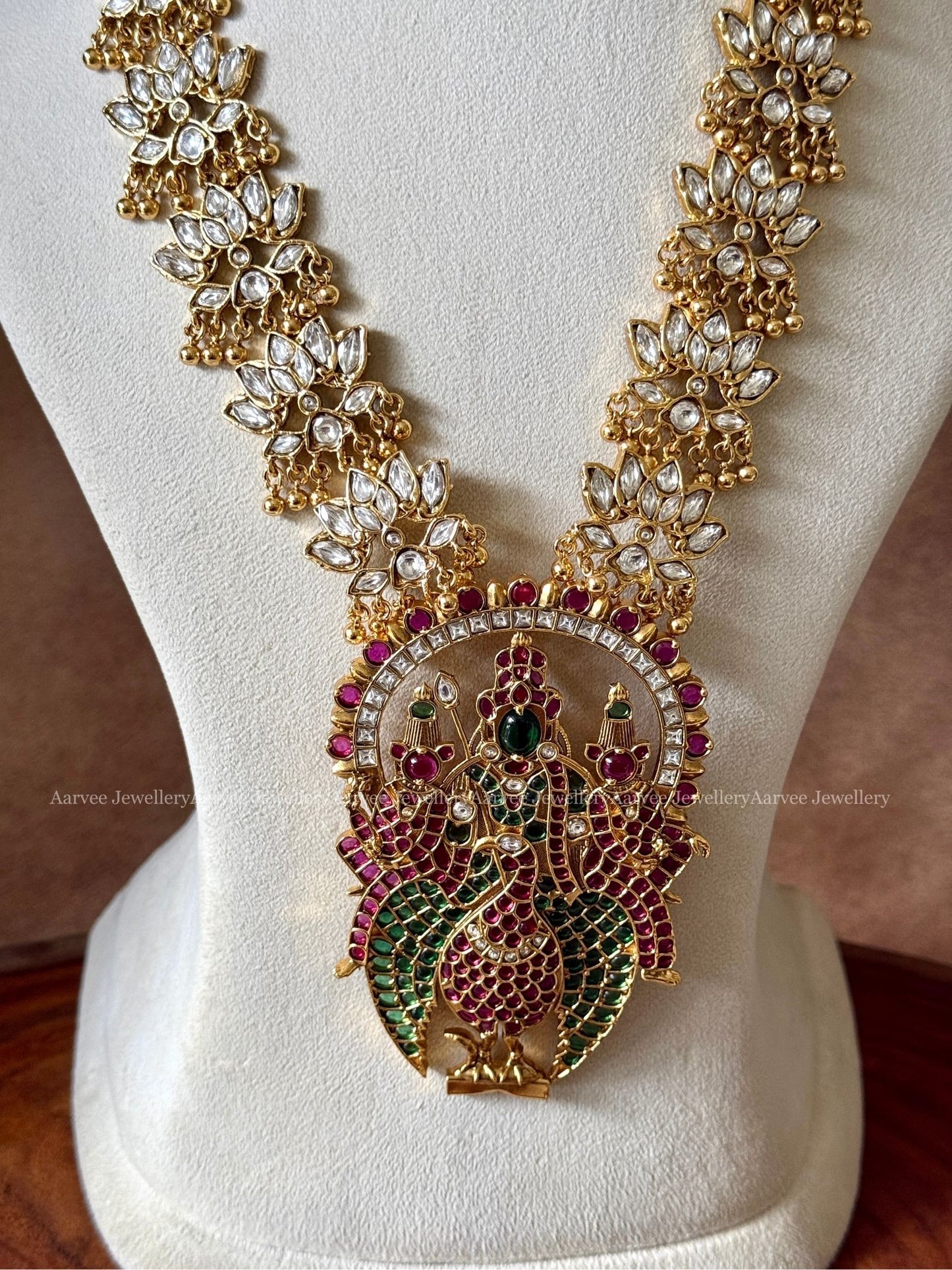 KUNDAN WHITE STONES LOTUS MOTIF HARAM WITH KEMP STONE STUDDED LORD MURUGAN PENDANT