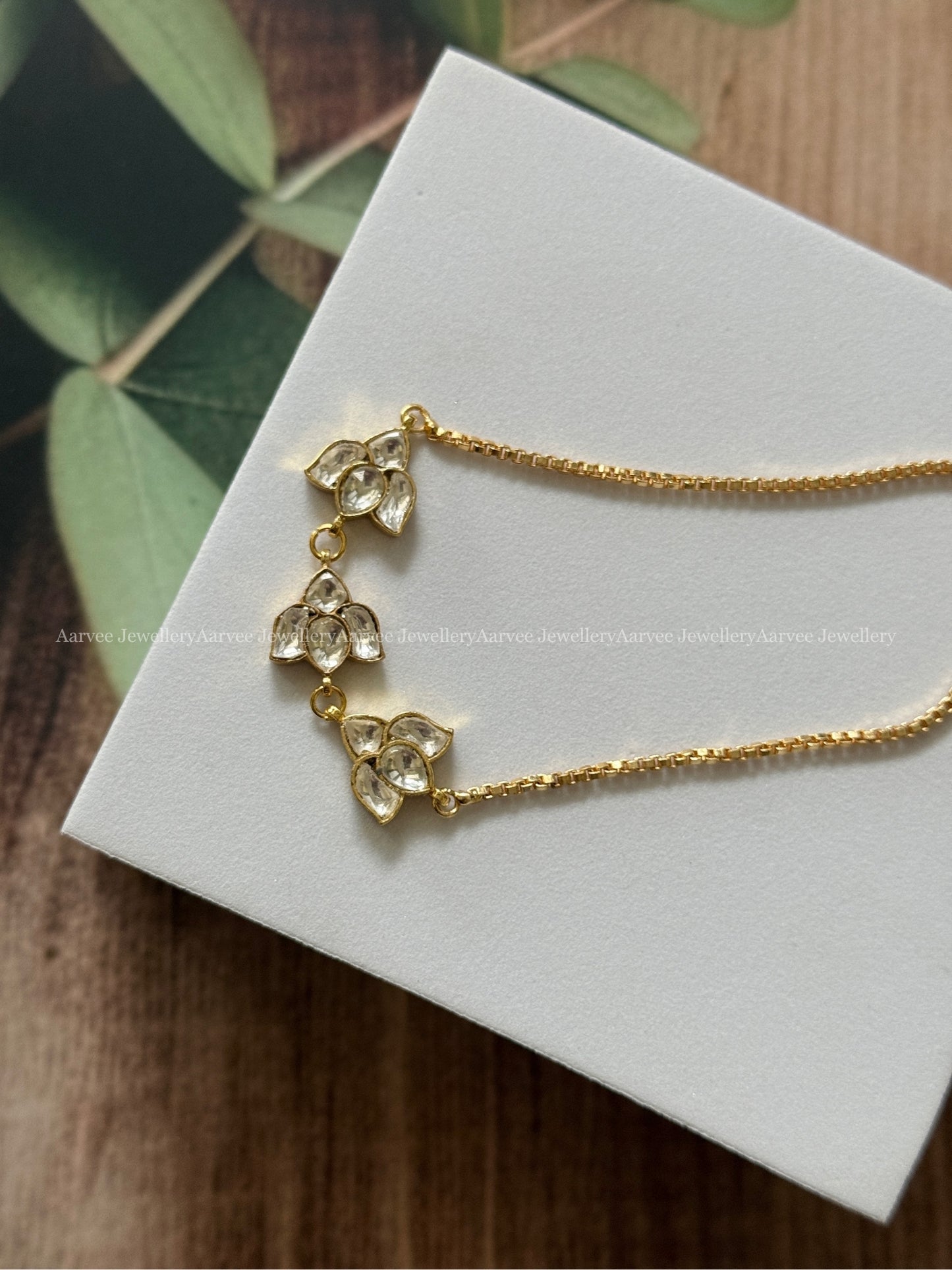 KUNDAN WHITE STONE LOTUS BRACELET