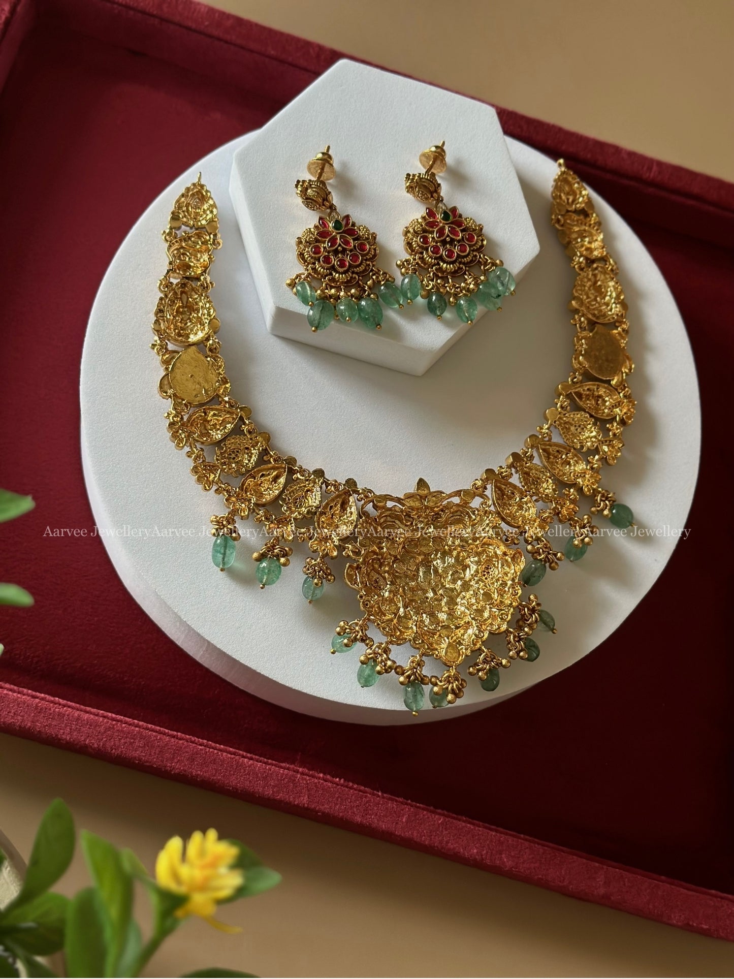 GOLD FINISHED LAKSHMI & FLORAL NECKLACE SET WITH PASTEL BEADS