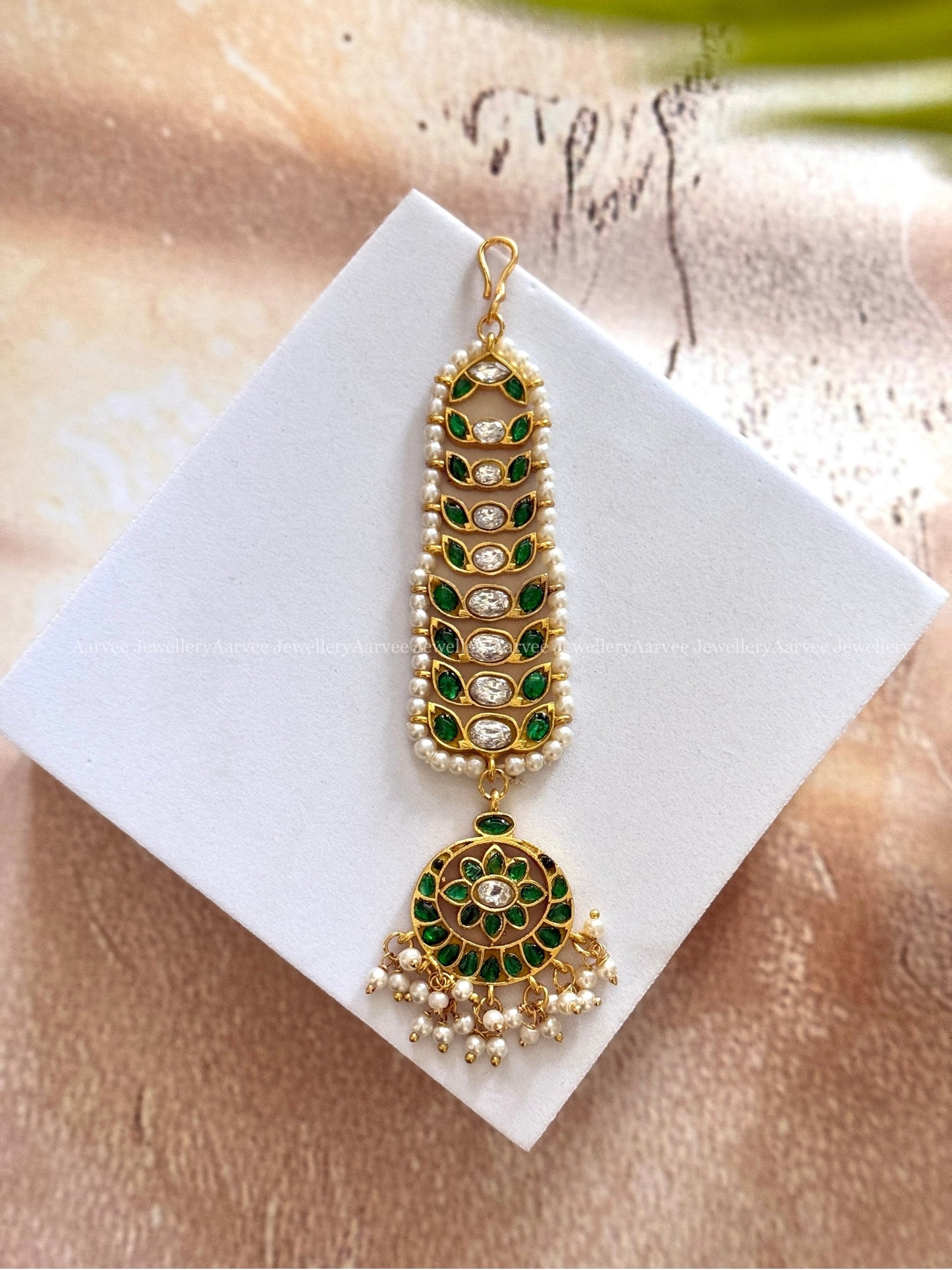 JADAU KUNDAN GREEN STONES FLORAL TIKKA
