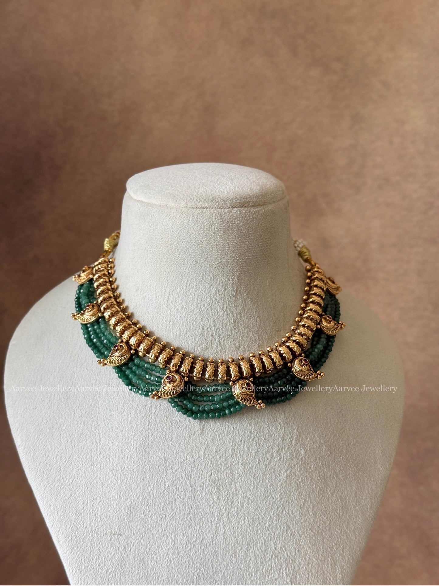 GREEN BEADS NECKLACE SET WITH GOLD FINISH PEACOCK DESIGN