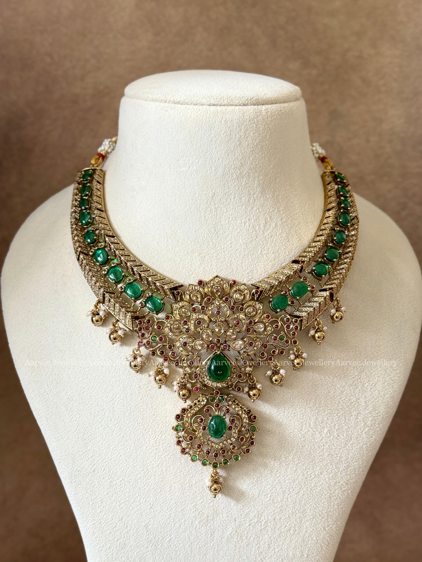 GREEN STONE PEACOCK DESIGN NECKLACE SET WITH GOLD BEADS - NON IDOL