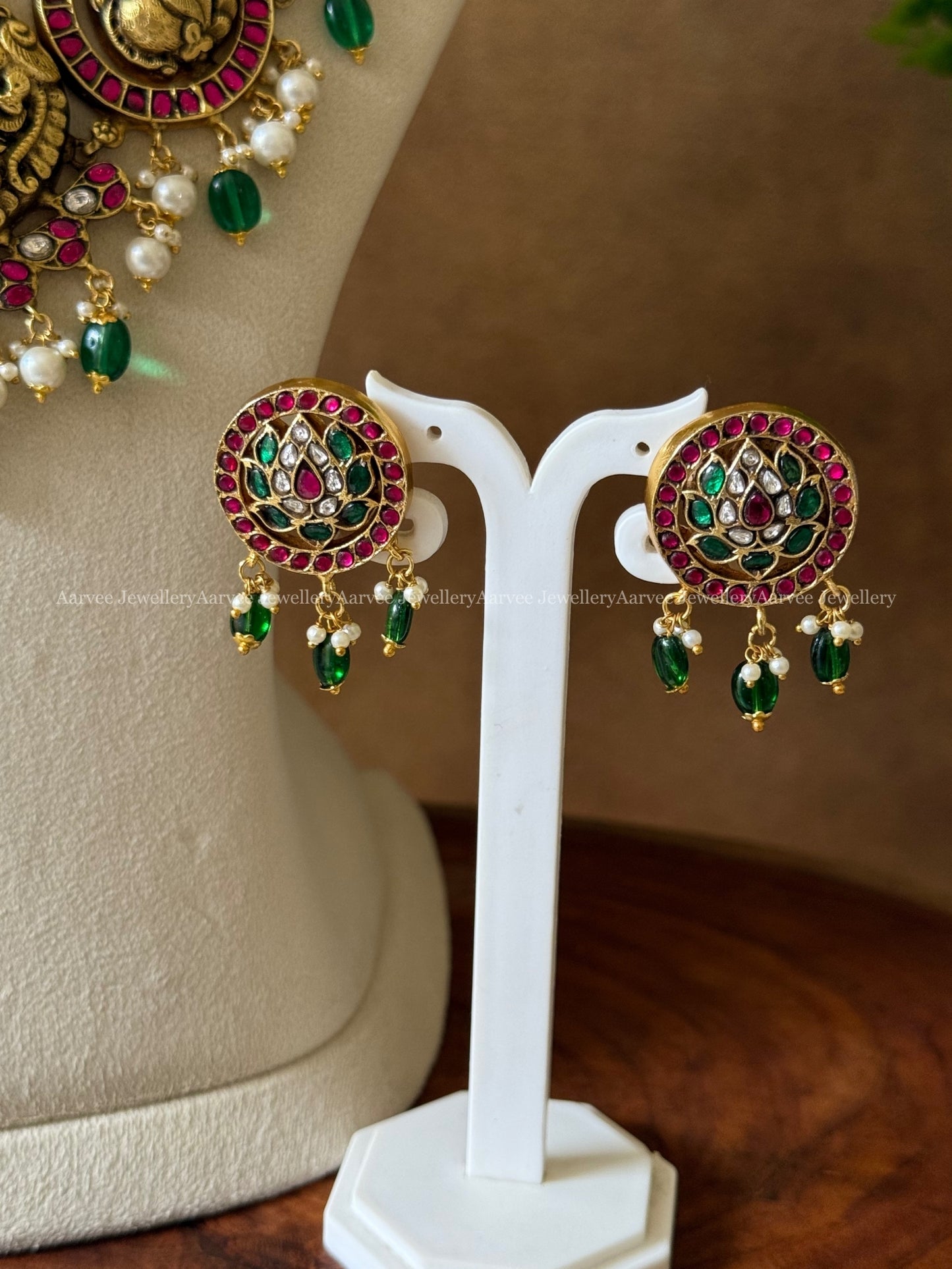JADAU KUNDAN PEARL BUNCH LAYERED MID LENGTH NECKLACE SET WITH NAKSHI & PEACOCK PENDANT WITH GREEN BEADS