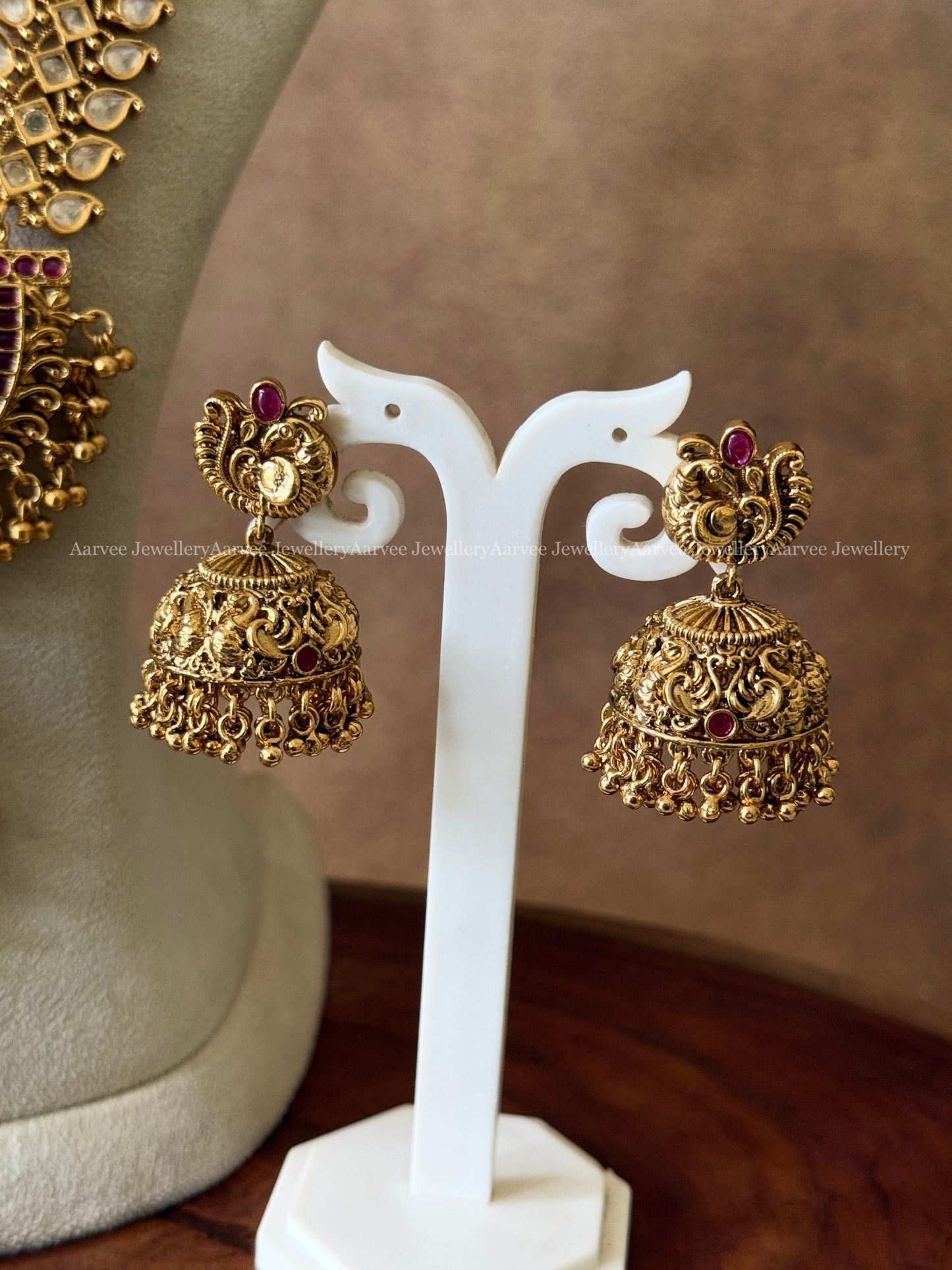 WHITE STONE HARAM WITH PEACOCK PENDANT IN RUBY STONES & GOLD BEADS