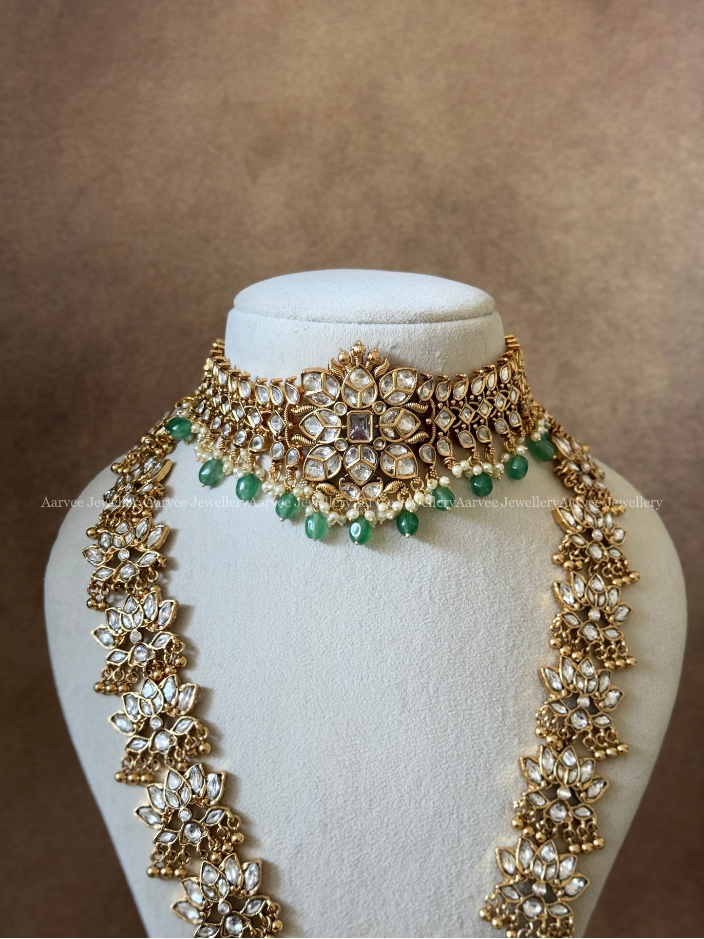 KUNDAN WHITE STONES HIGH NECK CHOKER | LOTUS MOTIF HARAM WITH LAKSHMI PEACOCK PENDANT WITH PASTEL BEADS