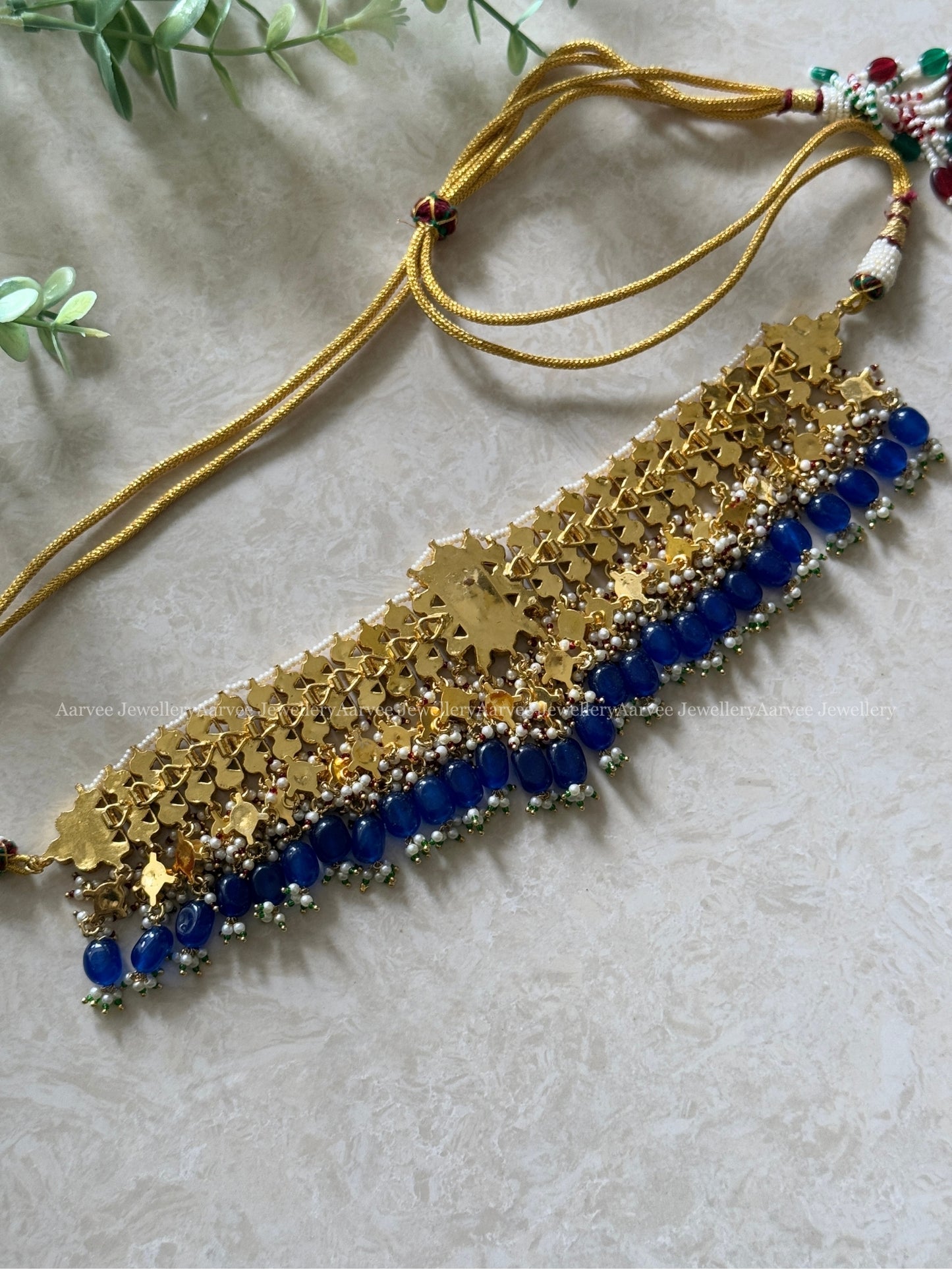 AN EXQUISITE POLKI KUNDAN GREEN & WHITE STONES BRIDAL CHOKER SET WITH BLUE BEADS