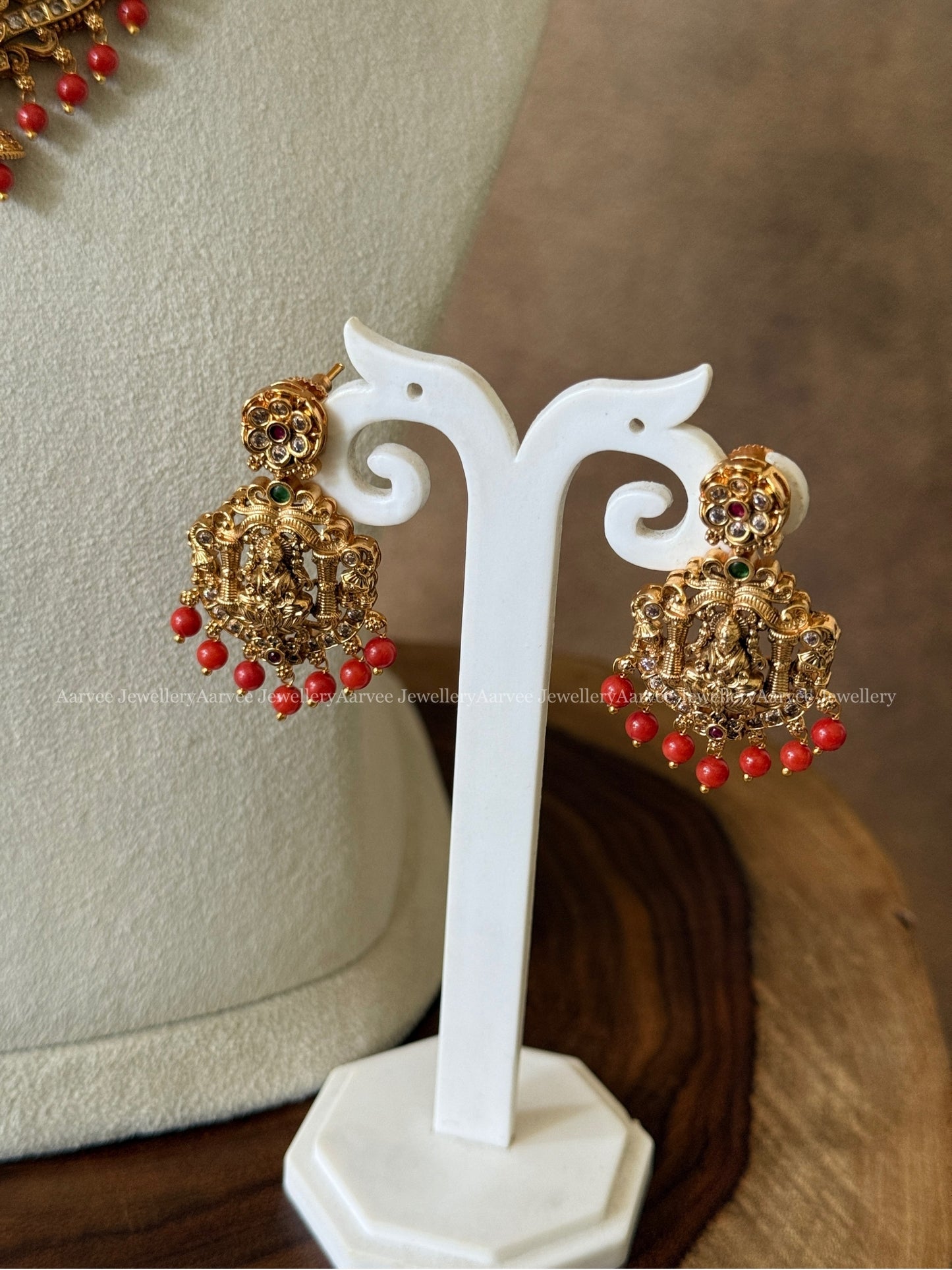 GOLD FINISH LAKSHMI NECKLACE SET WITH CORAL BEADS