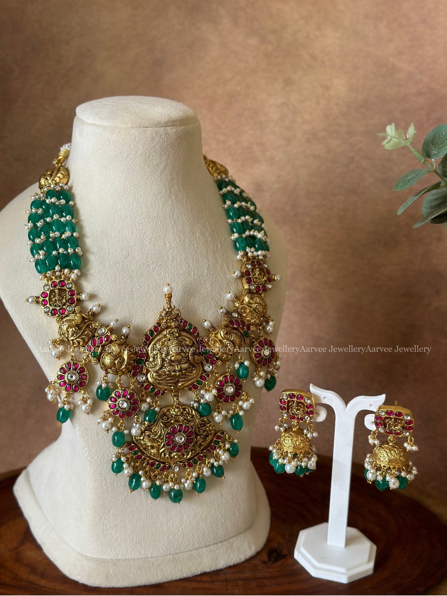 JADAU KUNDAN GREEN BEADED STATEMENT NECKLACE SET WITH NAGAS PENDANT