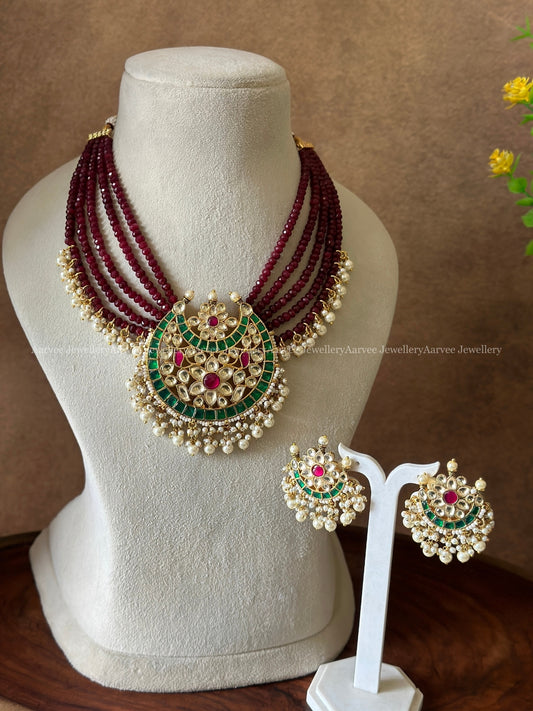 POLKI KUNDAN SET WITH LAYERED MAROON BEADS WITH KUNDAN PENDANT