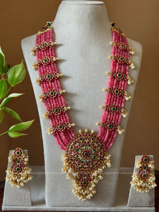PASTEL PINK BEADED LONG HARAM SET WITH A MULTI COLOR STONES KEMP PENDANT AND FLORAL SIDE MOTIFS