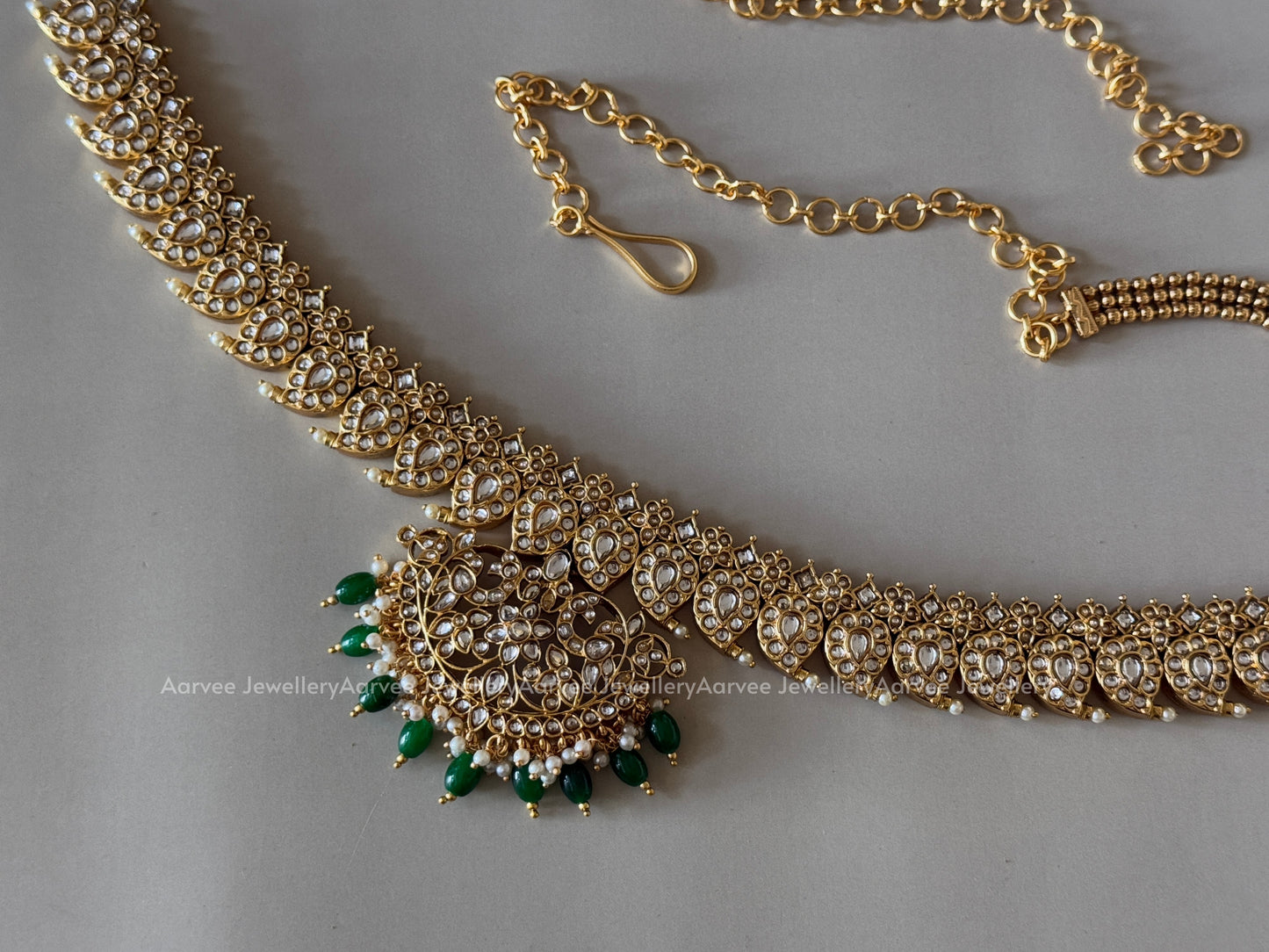 MANGO MOTIF KUNDAN WHITE STONES WAIST CHAIN WITH GREEN BEADS