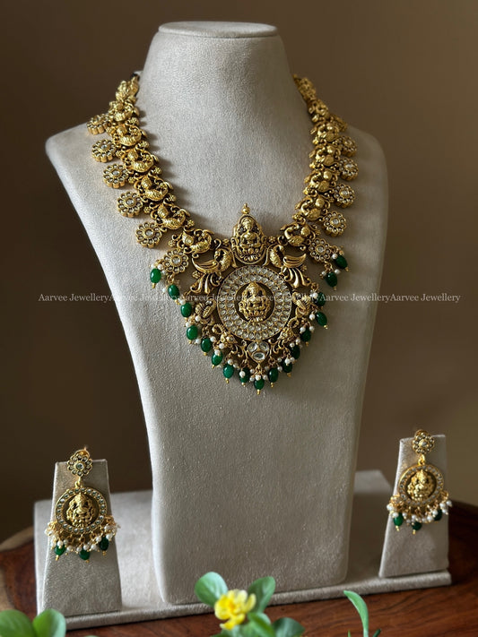 GOLD TONE NAGAS MOTIF NECKLACE SET WITH WHITE STONES & GREEN BEADS
