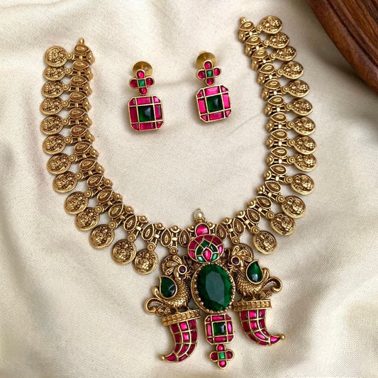 GOLD FINISH LAKSHMI COIN FUSION NECKLACE SET WITH KEMP STONES PEACOCK PENDANT