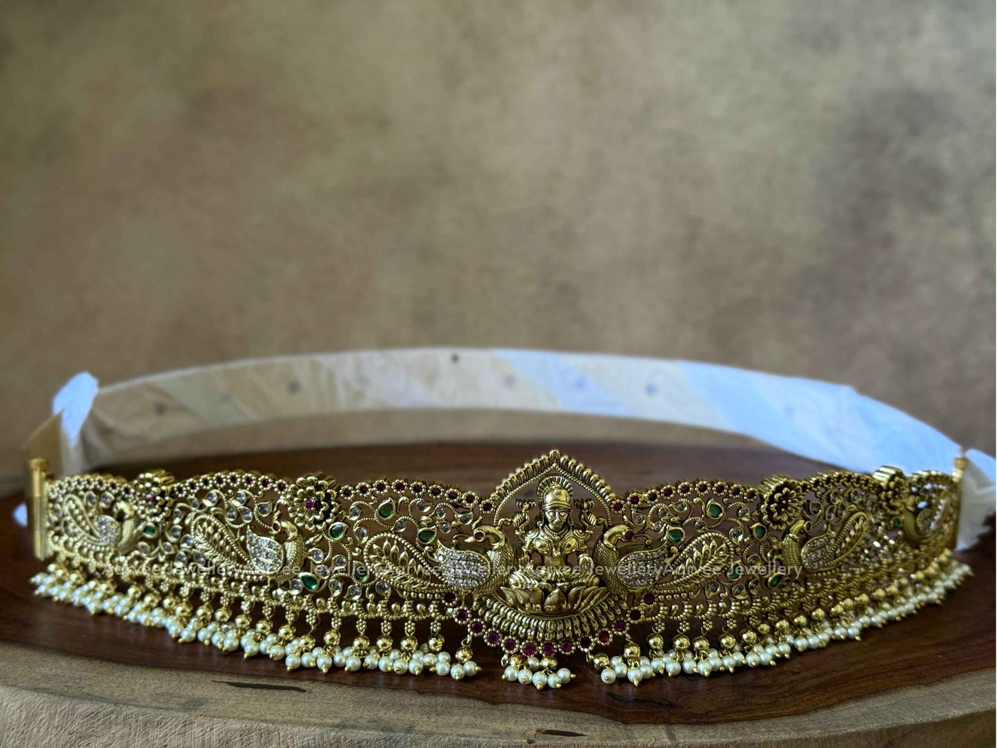 GOLD FINISH LAKSHMI & PEACOCK MOTIF WAIST BELT