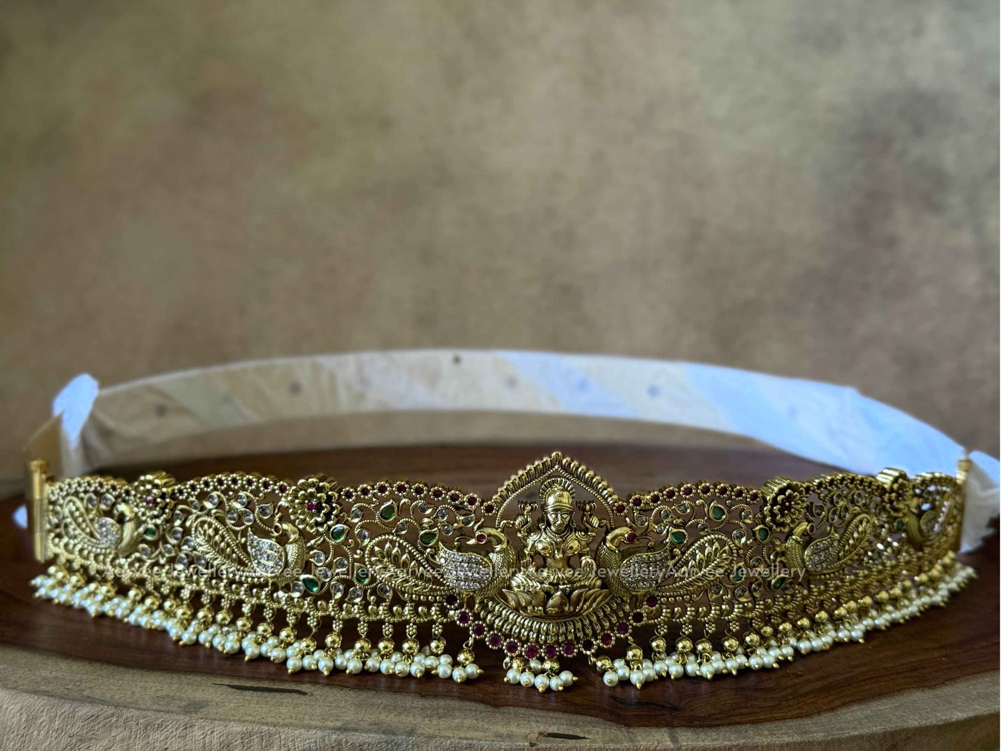 GOLD FINISH LAKSHMI & PEACOCK MOTIF WAIST BELT