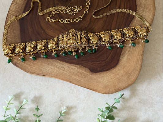 GOLD FINISH LAKSHMI & ELEPHANT MOTIF WAIST CHAIN WITH GREEN BEADS