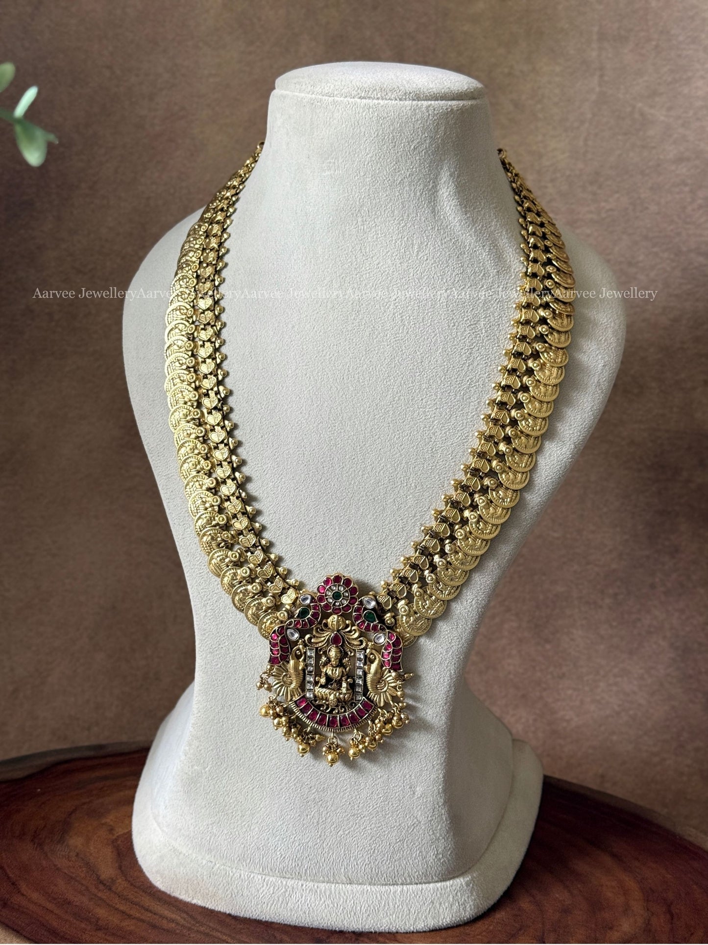 JADAU KUNDAN COIN MID LENGTH CHAIN WITH LAKSHMI PEACOCK PENDANT AND GOLD BEADS