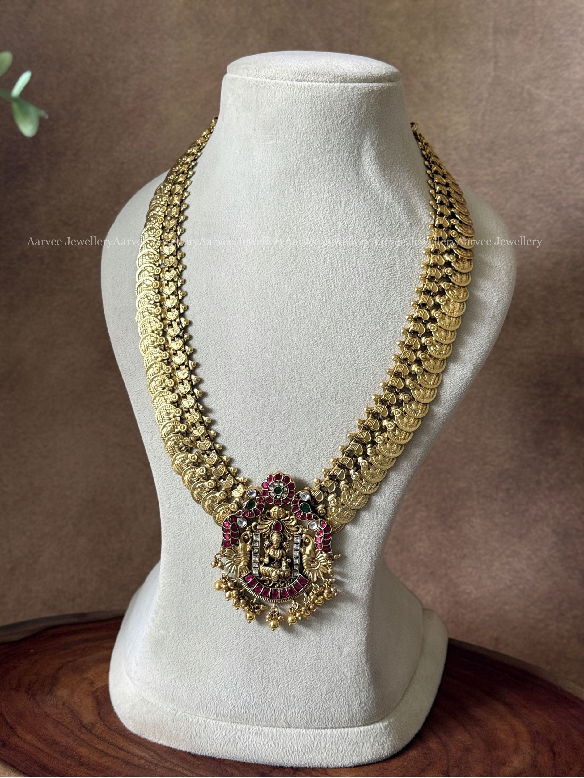 JADAU KUNDAN COIN MID LENGTH CHAIN WITH LAKSHMI PEACOCK PENDANT AND GOLD BEADS