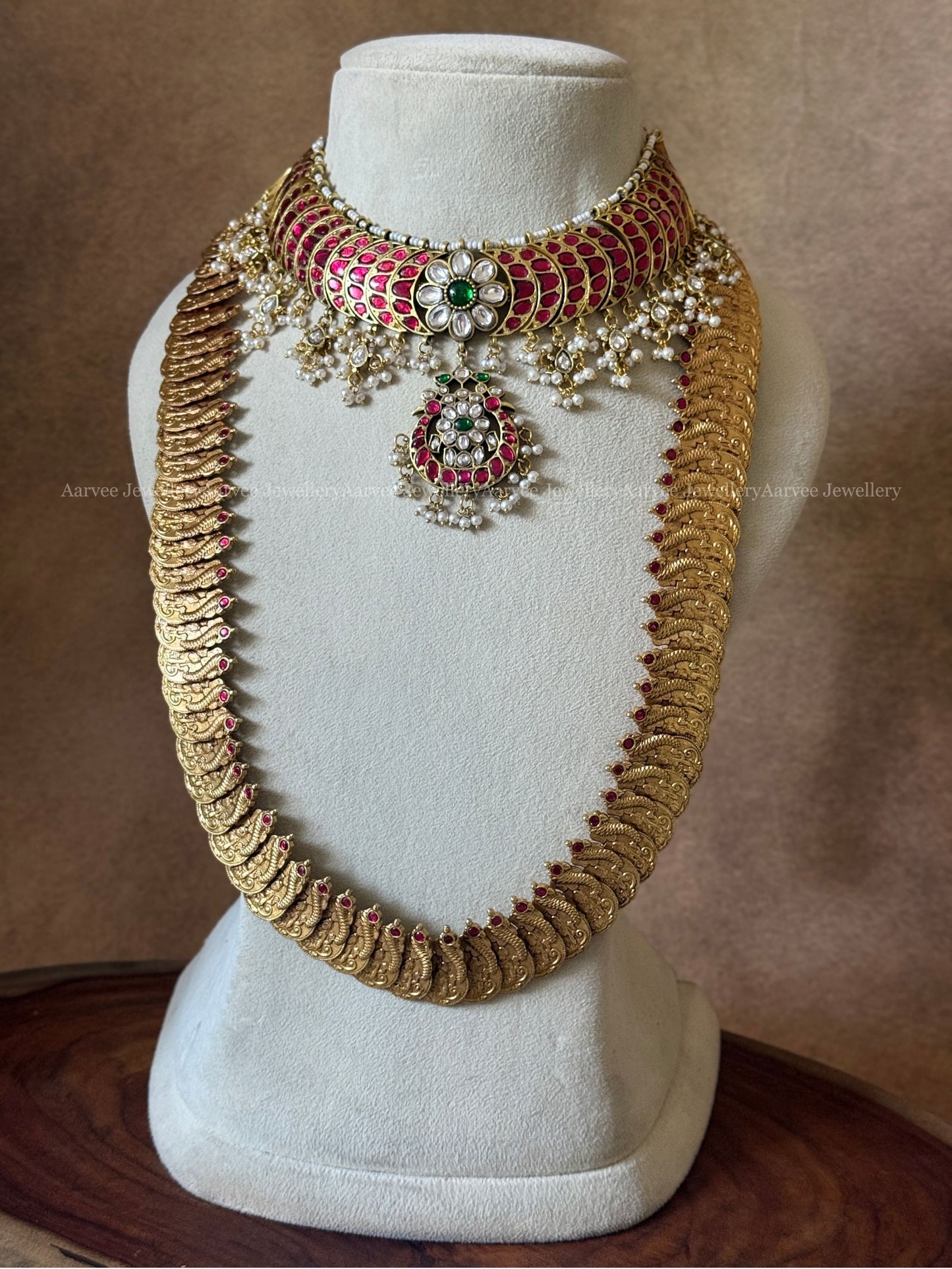 JADAU KUNDAN RUBY STONE CRESCENT AND FLORAL NECKLACE WITH PEACOCK MOTIF COIN HARAM