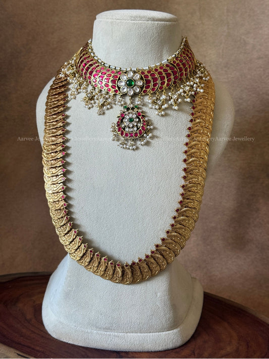JADAU KUNDAN RUBY STONE CRESCENT AND FLORAL NECKLACE WITH PEACOCK MOTIF COIN HARAM