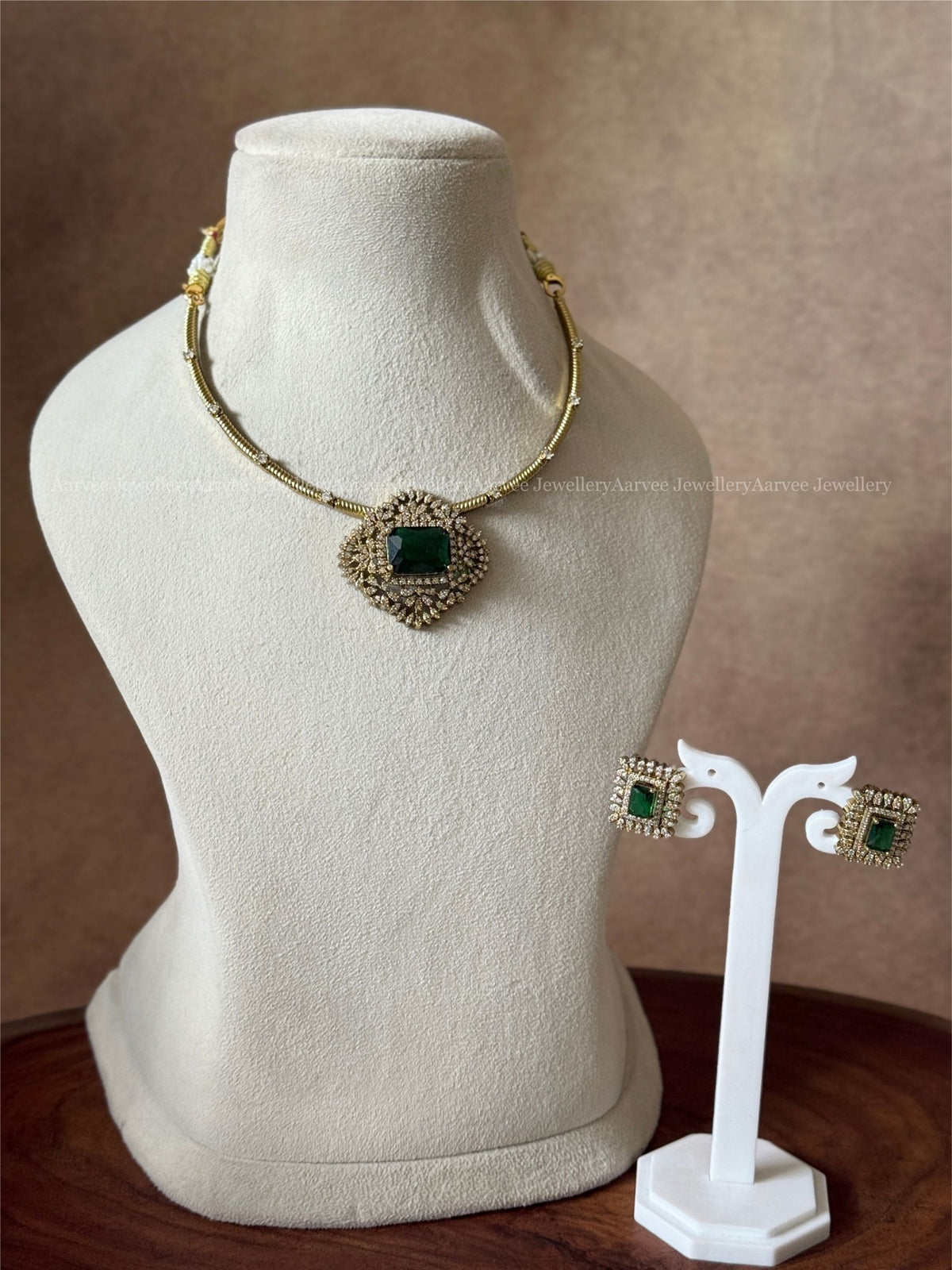 GOLD TONE KANTI NECKLACE SET WITH GREEN STONE CZ PENDANT
