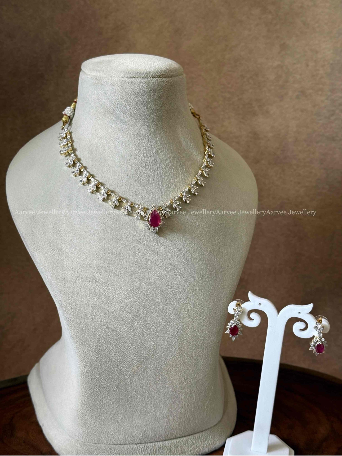 AD WHITE STONE NECKLACE SET WITH RUBY CENTER PENDANT
