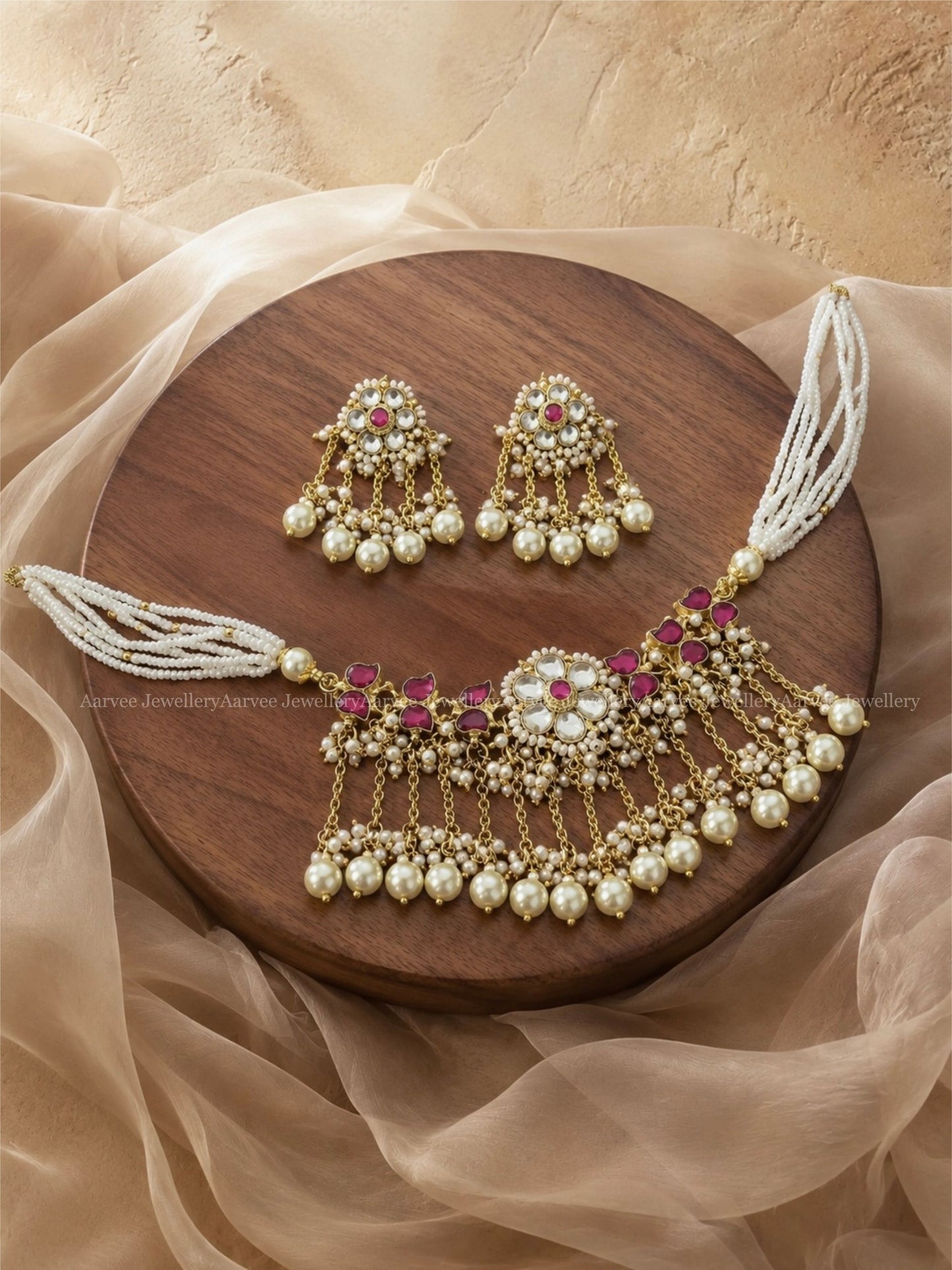 POLKI KUNDAN RUBY / WHITE STONE FLORAL AND LEAF MOTIF PEARL CHOKER SET