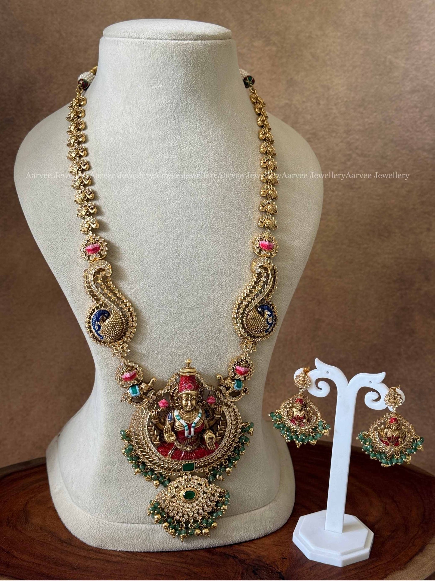 GOLD TONE LAKSHMI HARAM SET WITH GOLD AND GREEN BEADS