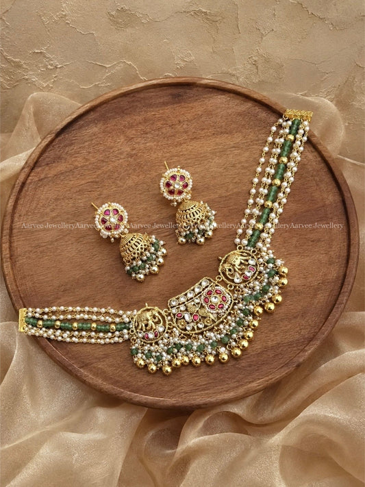 POLKI KUNDAN GOLD FINISH ELEPHANT MOTIF PEARL AND PASTEL BEAD CHOKER SET