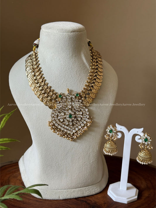 PREMIUM COIN NECKLACE SET WITH WHITE KUNDAN PEACOCK PENDANT AND GOLD BEADS