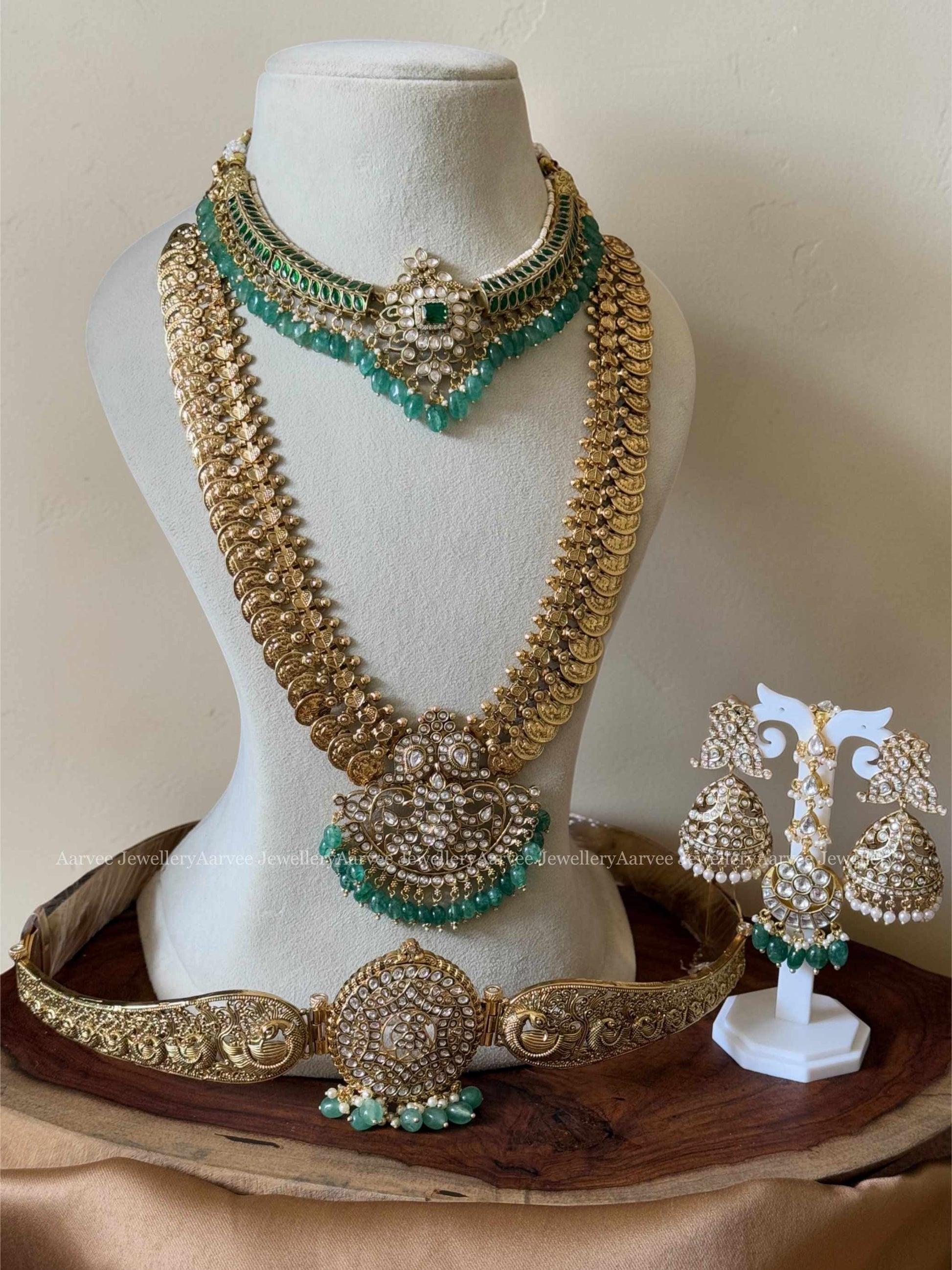 KUNDAN BRIDAL JEWELLERY - GREEN STONE KANTI NECKLACE, COIN HARAM SET, WAIST BELT AND TIKKA WITH PASTEL GREEN BEADS