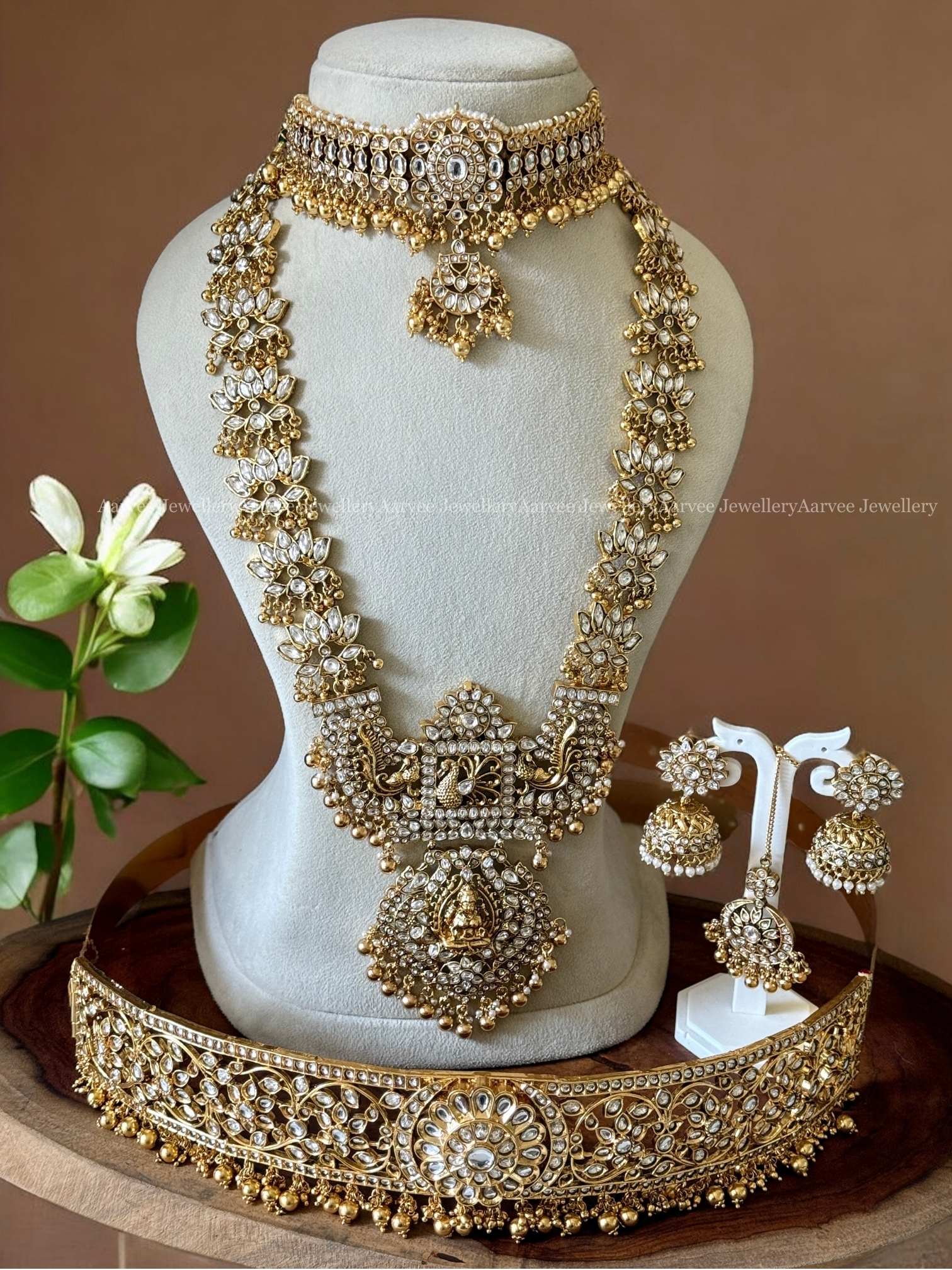 AN EXQUISITE WHITE KUNDAN STONES  LOTUS & LAKSHMI  BRIDAL JEWELLERY