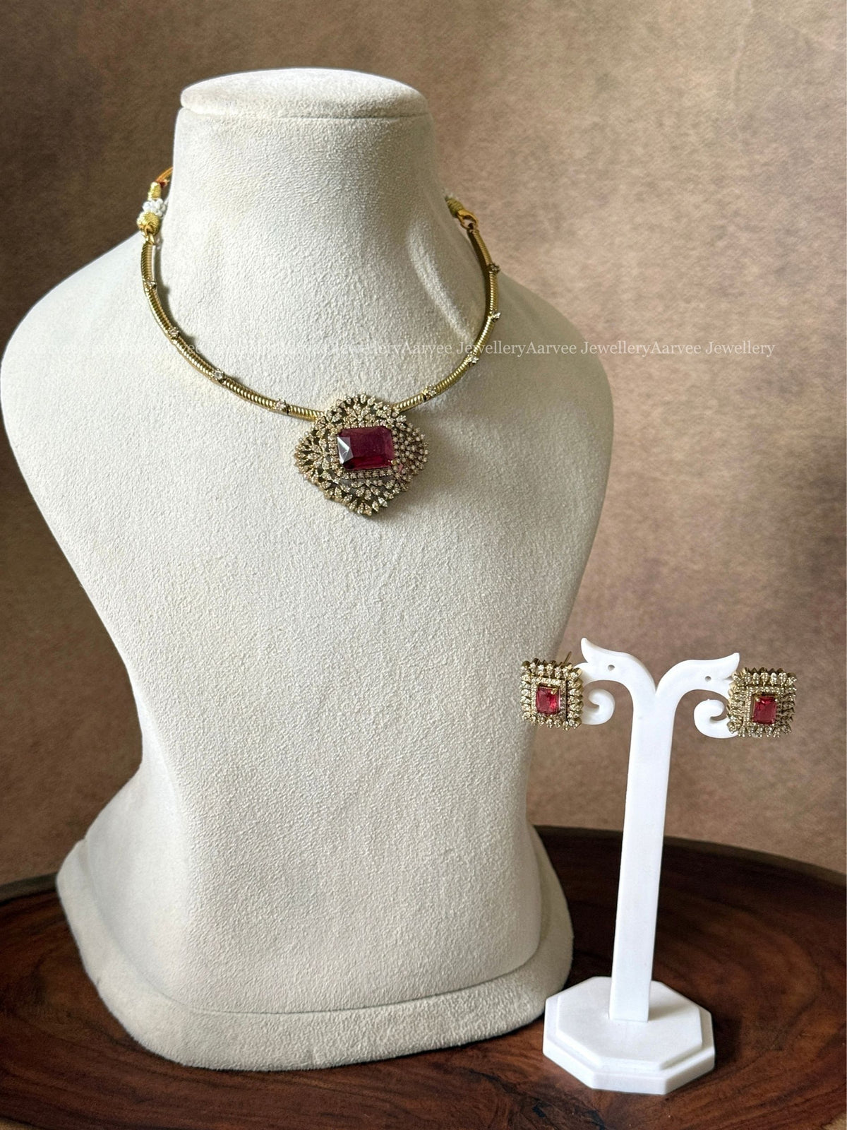 GOLD TONE KANTI NECKLACE SET WITH RED STONE CZ PENDANT