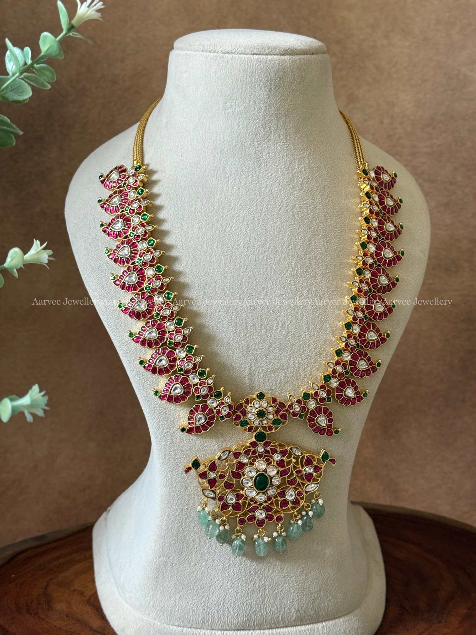 JADAU KUNDAN MANGO MOTIF HARAM WITH RUBY STONES AND PASTEL BEADS