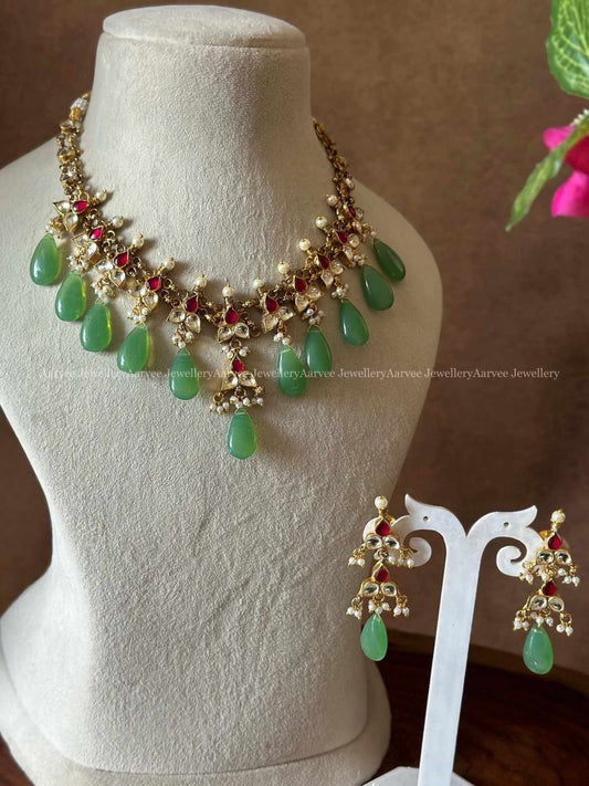 POLKI KUNDAN RUBY STONE NECKLACE SET WITH PASTEL TEAR DROP BEADS