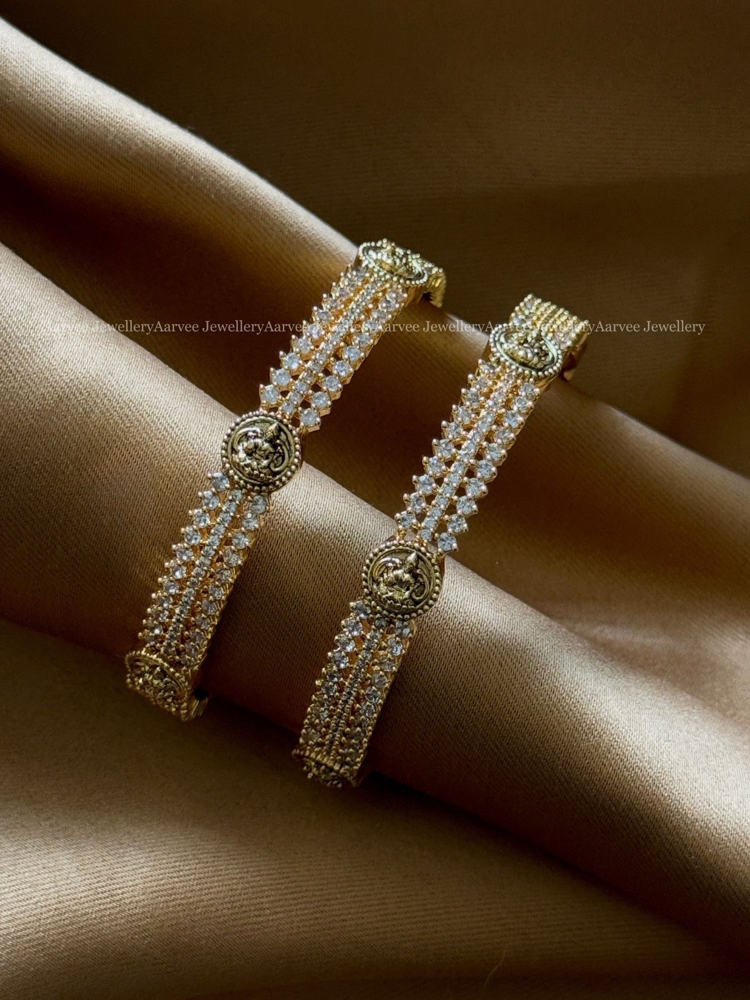 WHITE AD STONE AND LAKSHMI MOTIF BANGLES