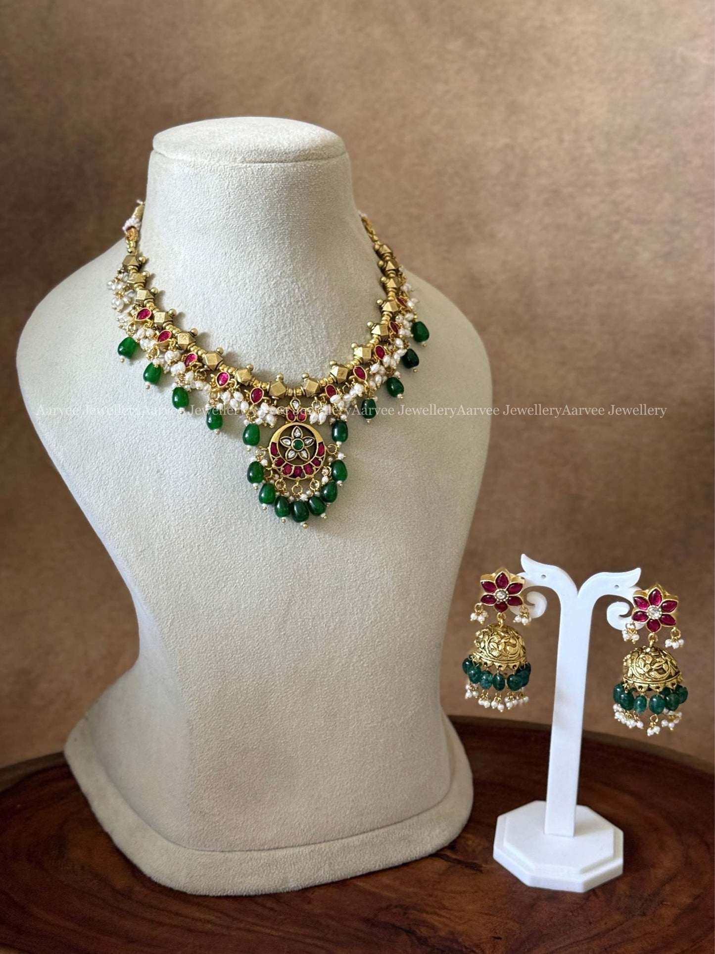 JADAU KUNDAN GOLD BALL BEADED NECKLACE WITH FLORAL JHUMKI IN GREEN BEADS